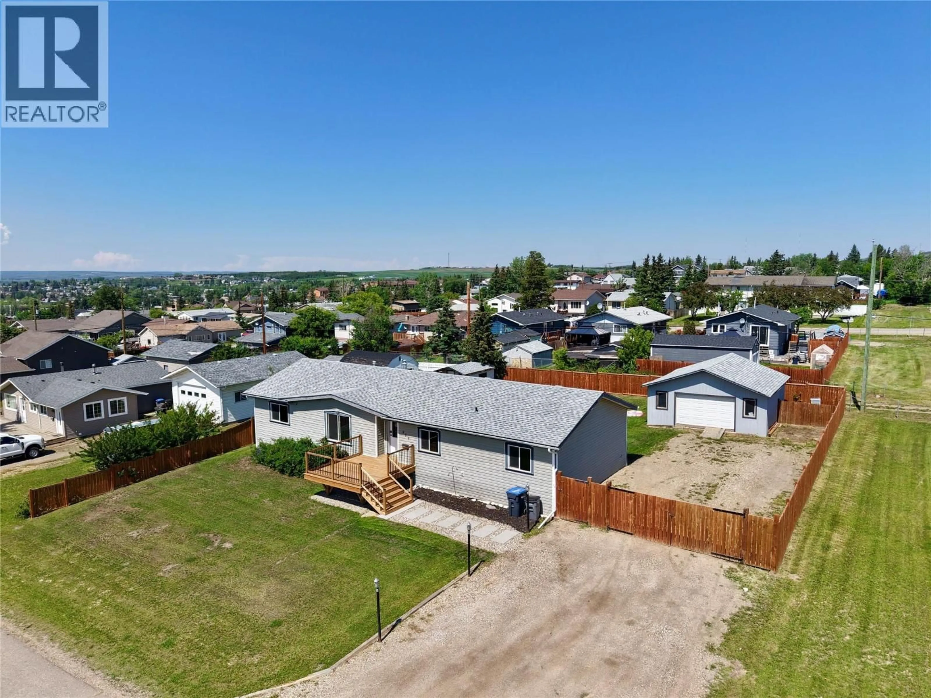 A pic from outside/outdoor area/front of a property/back of a property/a pic from drone, street for 500 99 AVENUE, Dawson Creek British Columbia V1G1T3