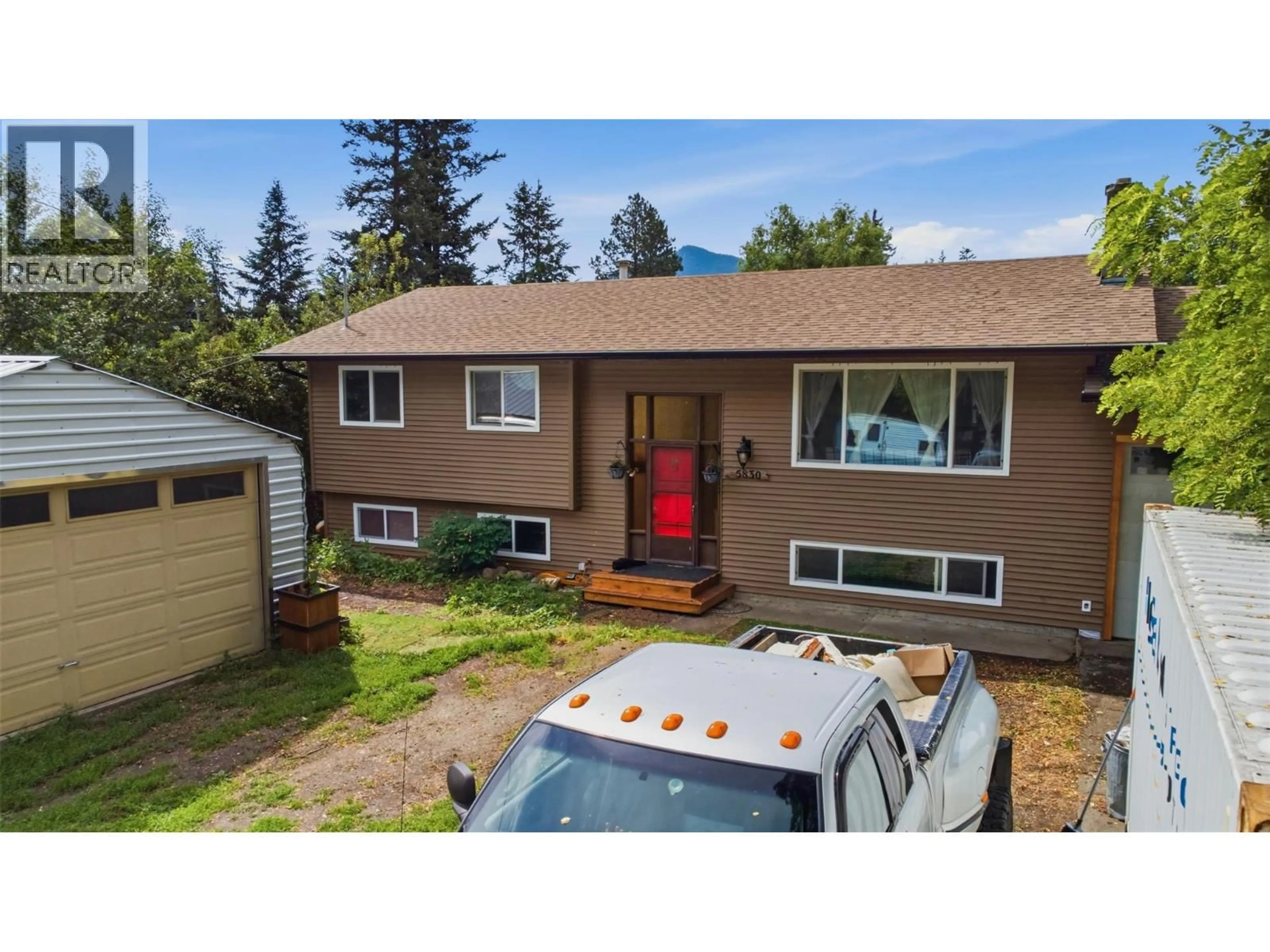 A pic from outside/outdoor area/front of a property/back of a property/a pic from drone, street for 5830 6 HIGHWAY, Lavington British Columbia V1B3E1