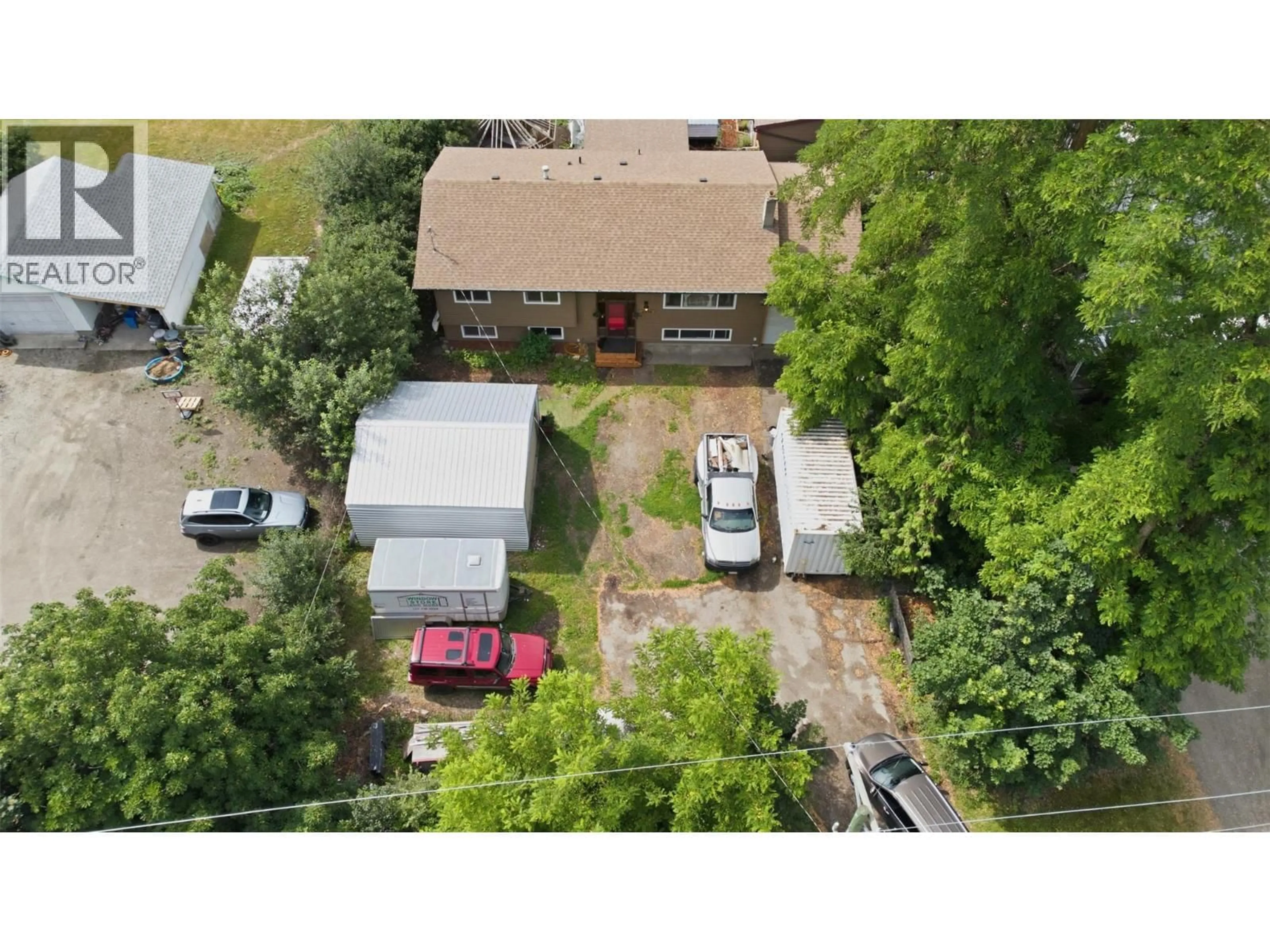 A pic from outside/outdoor area/front of a property/back of a property/a pic from drone, street for 5830 6 HIGHWAY, Lavington British Columbia V1B3E1