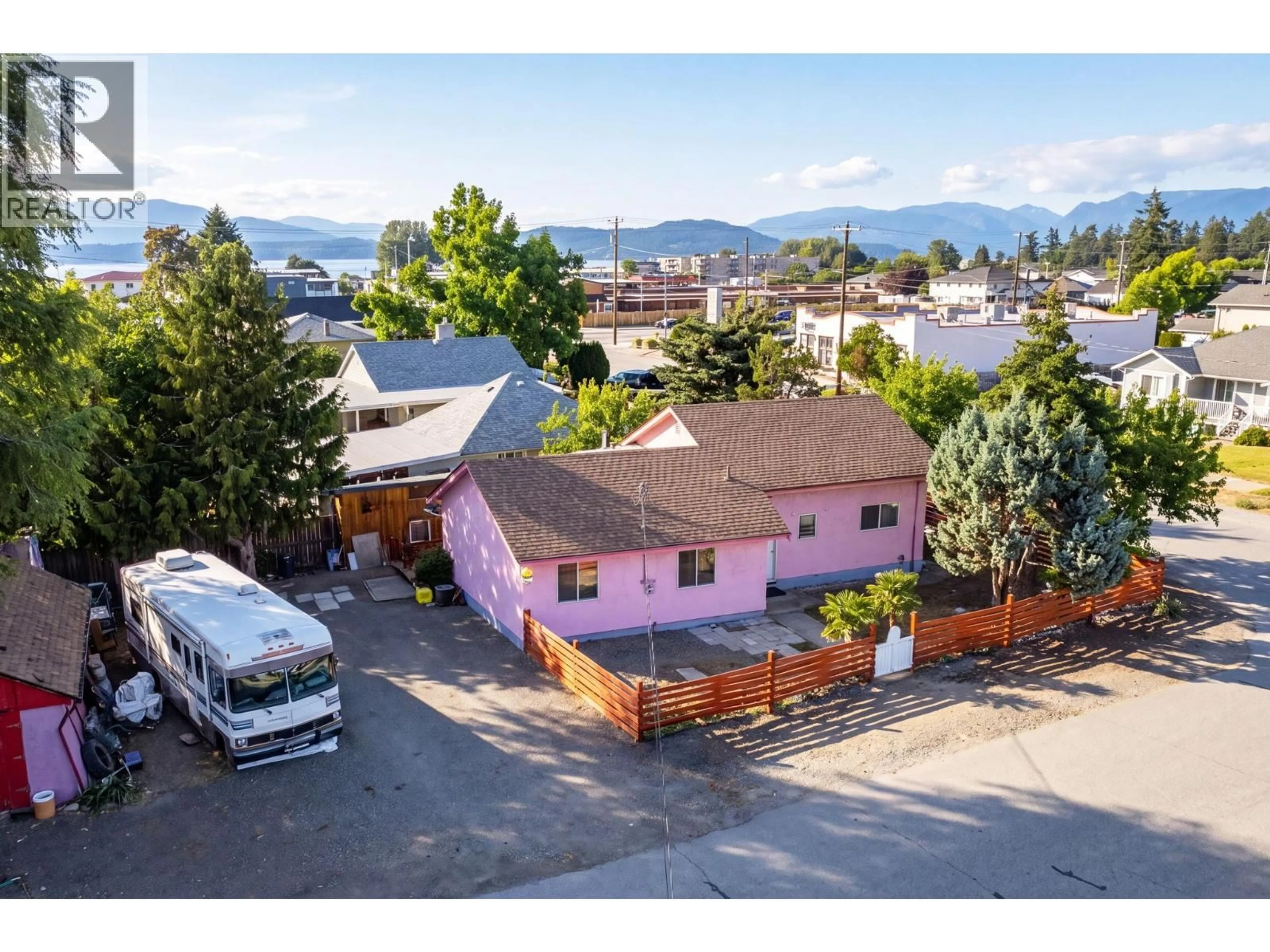A pic from outside/outdoor area/front of a property/back of a property/a pic from drone, mountain view for 6002 COTTONWOOD DRIVE, Osoyoos British Columbia V0H1V3