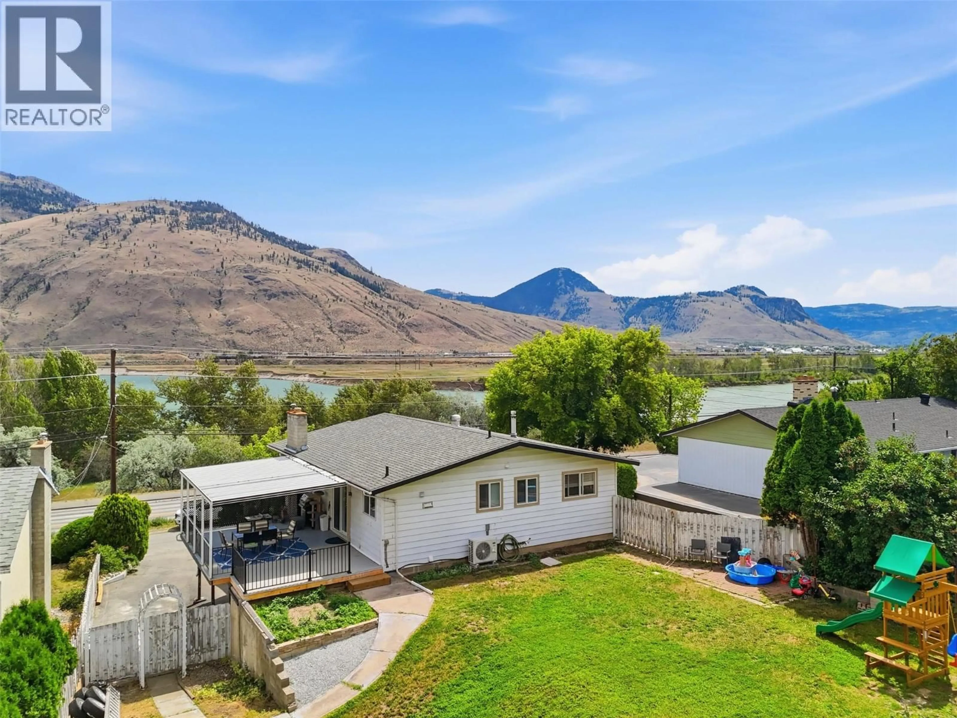A pic from outside/outdoor area/front of a property/back of a property/a pic from drone, mountain view for 2346 WESTSYDE ROAD, Kamloops British Columbia V2B7C4