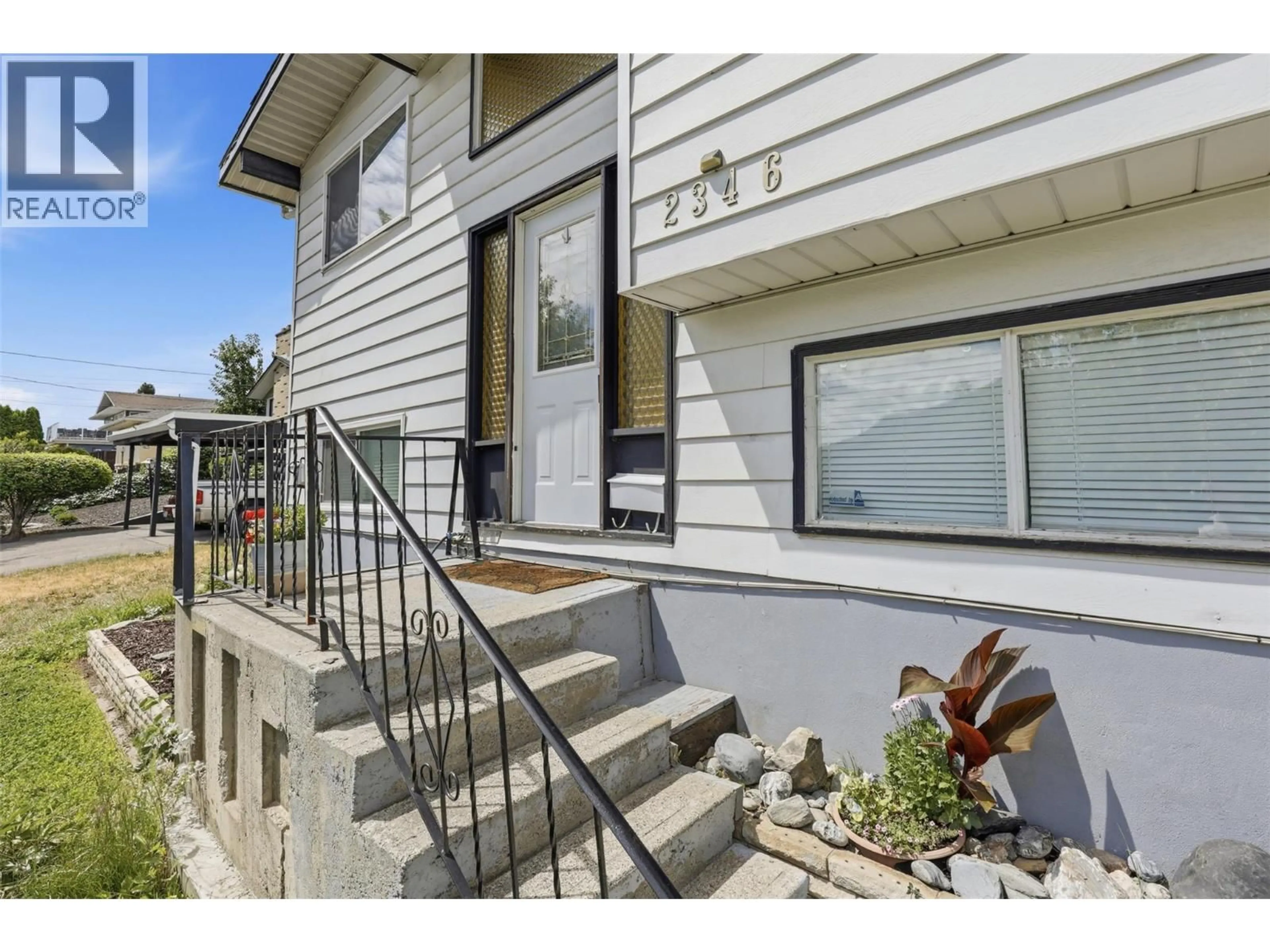 Home with vinyl exterior material, street for 2346 WESTSYDE ROAD, Kamloops British Columbia V2B7C4