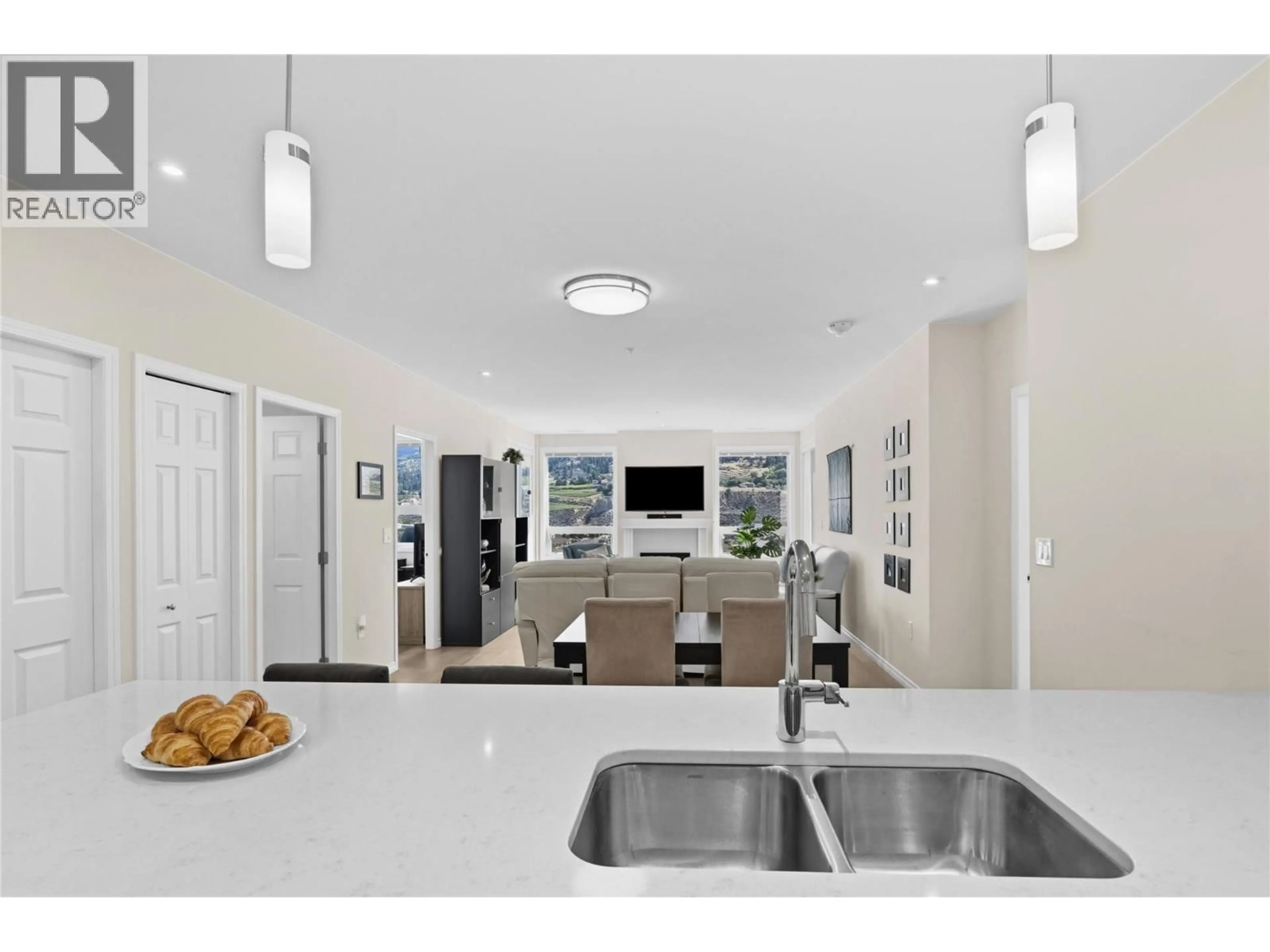 Open concept kitchen, ceramic/tile floor for 1206 - 3346 SKAHA LAKE ROAD, Penticton British Columbia V2A0H6