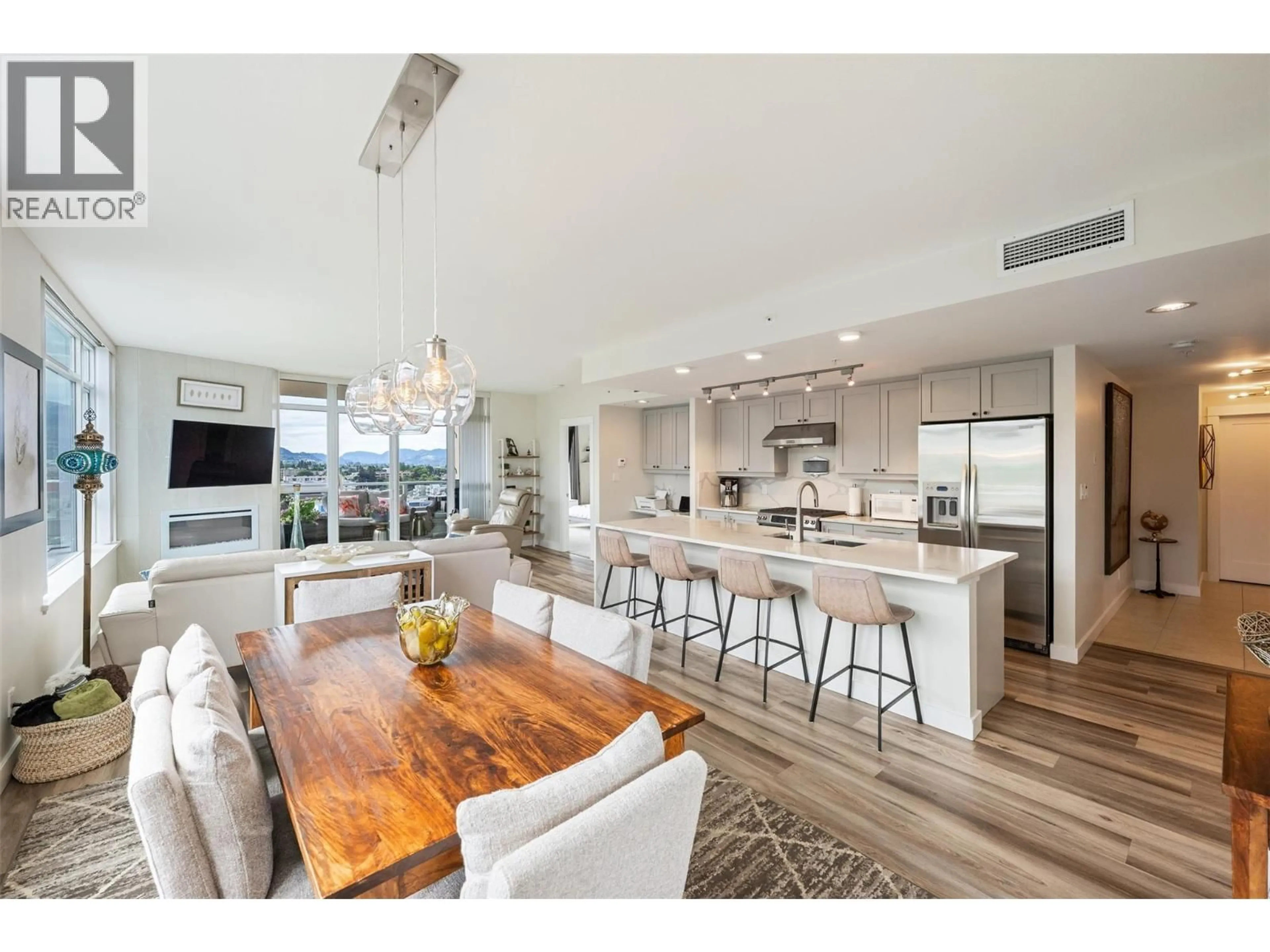Open concept kitchen, wood/laminate floor for 1204 - 75 MARTIN STREET, Penticton British Columbia V2A9C8