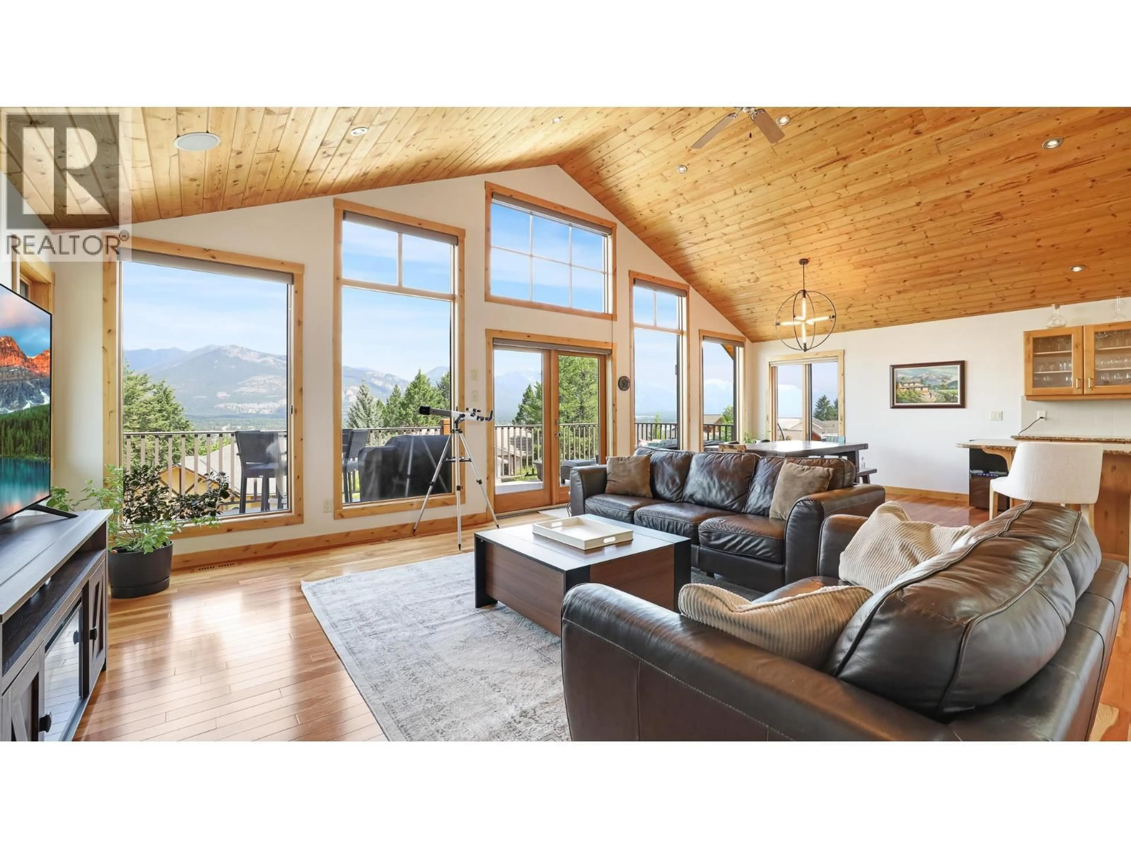 Living room with furniture, wood/laminate floor for 1910 PINERIDGE DRIVE, Invermere British Columbia V0A1K4
