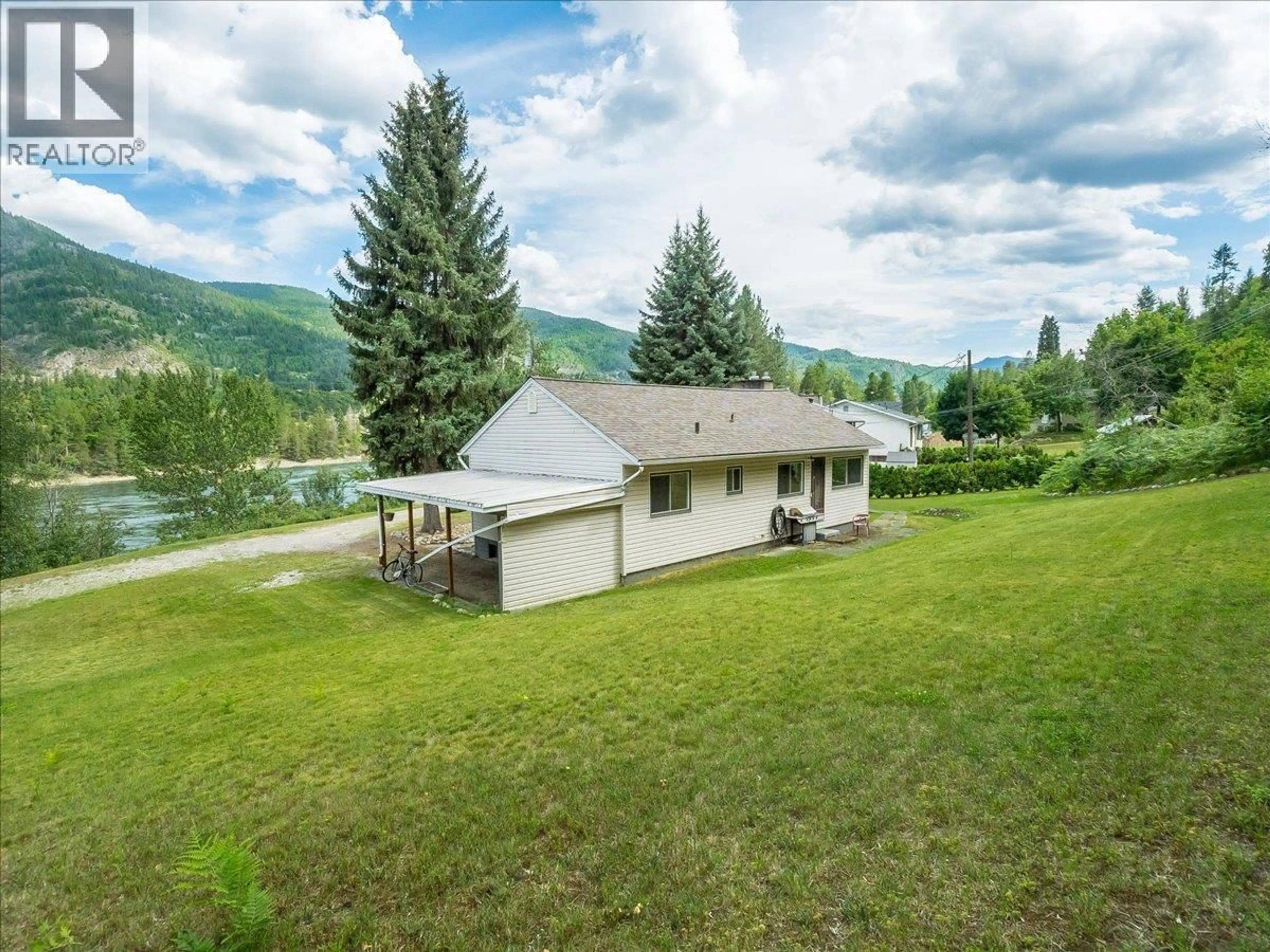 A pic from outside/outdoor area/front of a property/back of a property/a pic from drone, mountain view for 2800 1ST AVENUE, Castlegar British Columbia V1N2R2