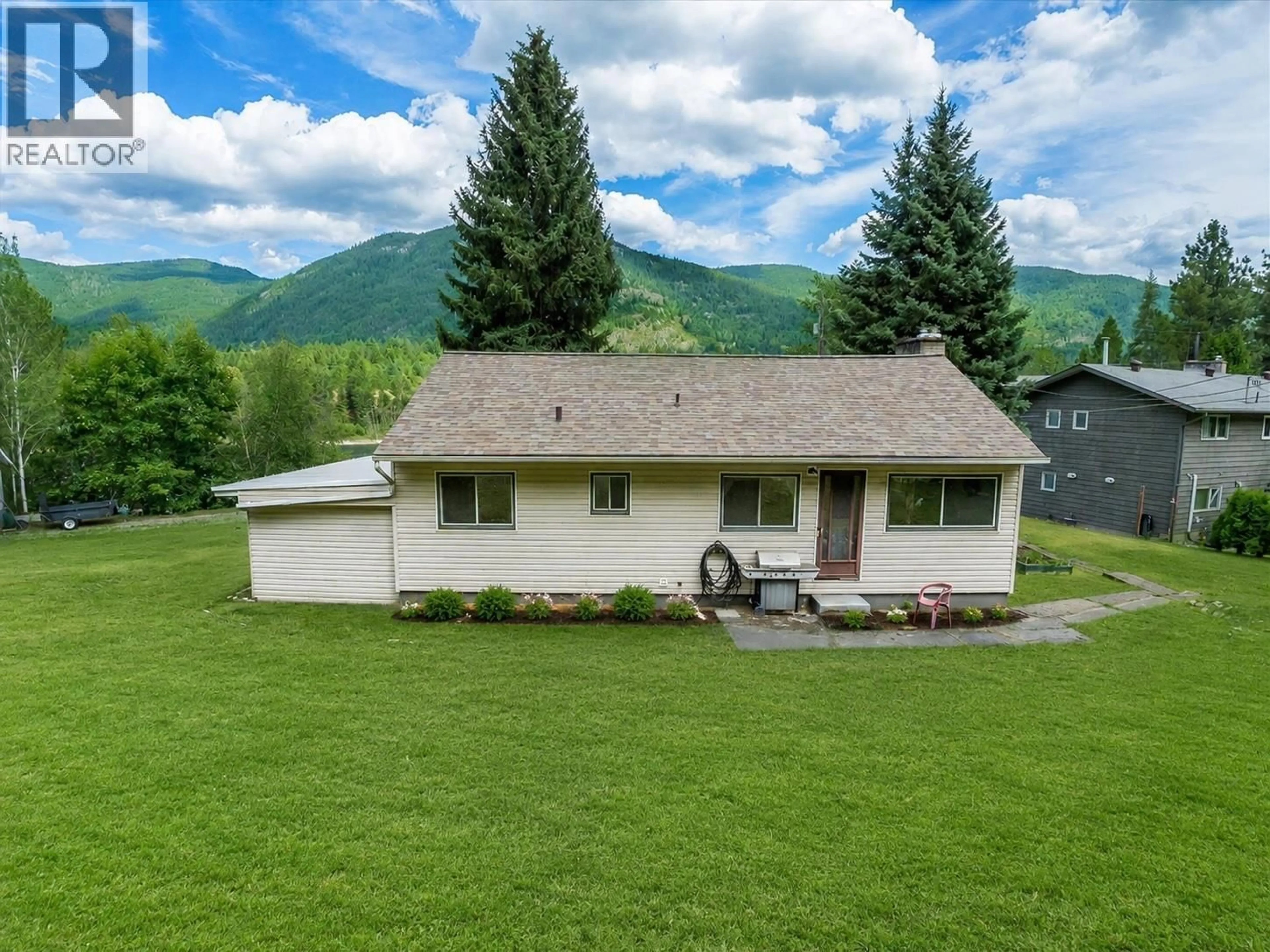 A pic from outside/outdoor area/front of a property/back of a property/a pic from drone, mountain view for 2800 1ST AVENUE, Castlegar British Columbia V1N2R2