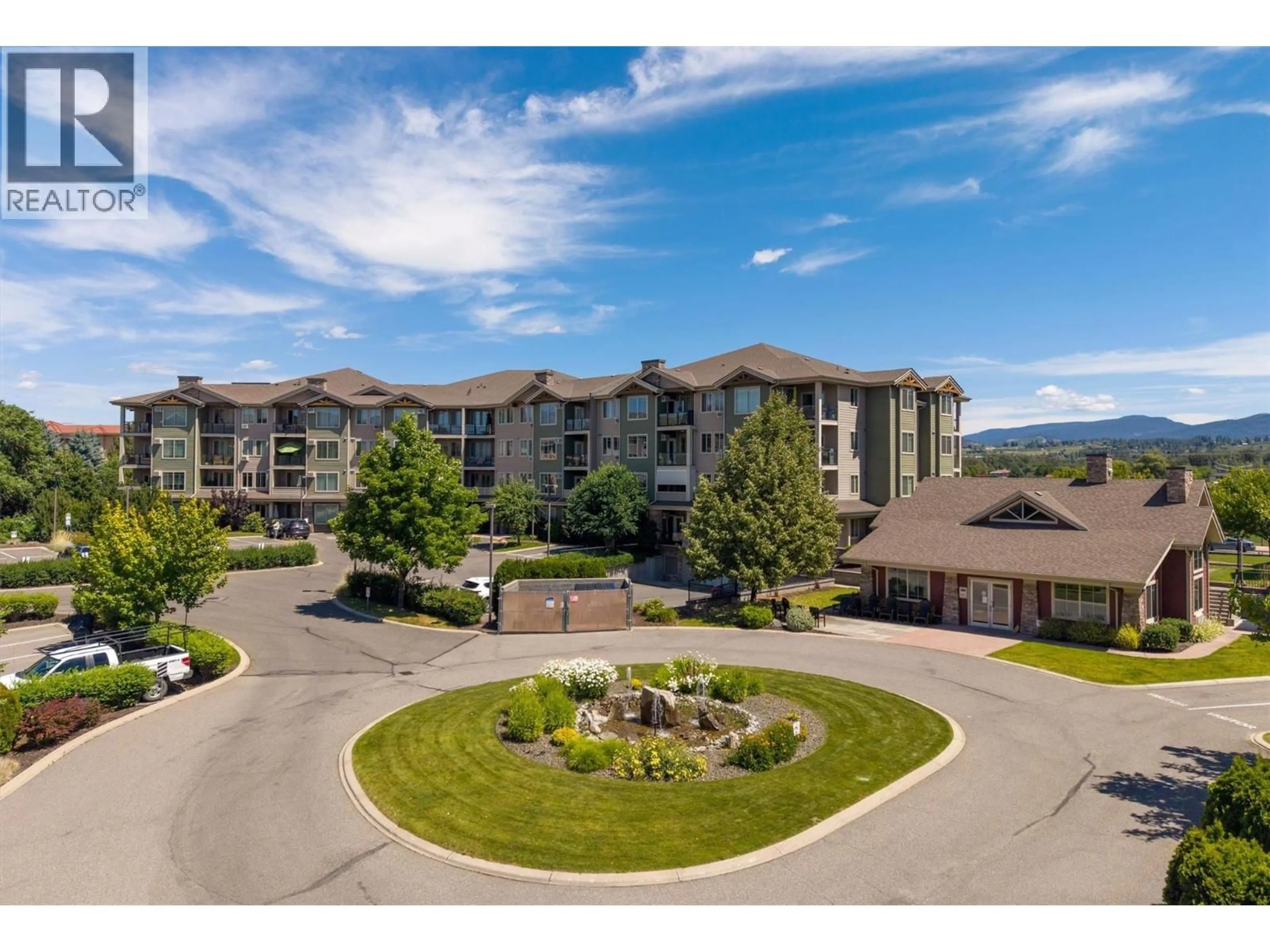 A pic from outside/outdoor area/front of a property/back of a property/a pic from drone, mountain view for 411 - 3735 CASORSO ROAD, Kelowna British Columbia V1W5E3