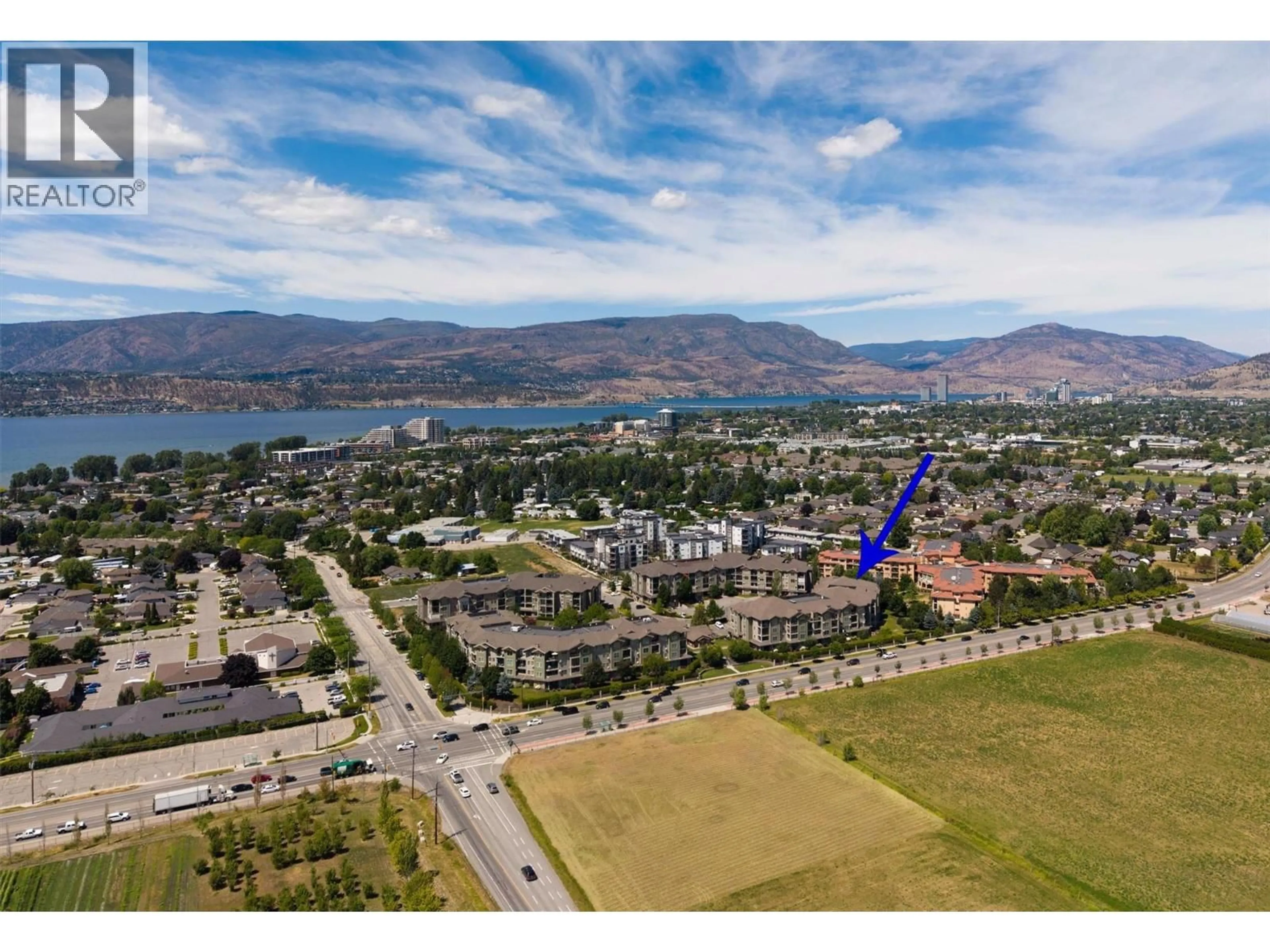 A pic from outside/outdoor area/front of a property/back of a property/a pic from drone, mountain view for 411 - 3735 CASORSO ROAD, Kelowna British Columbia V1W5E3