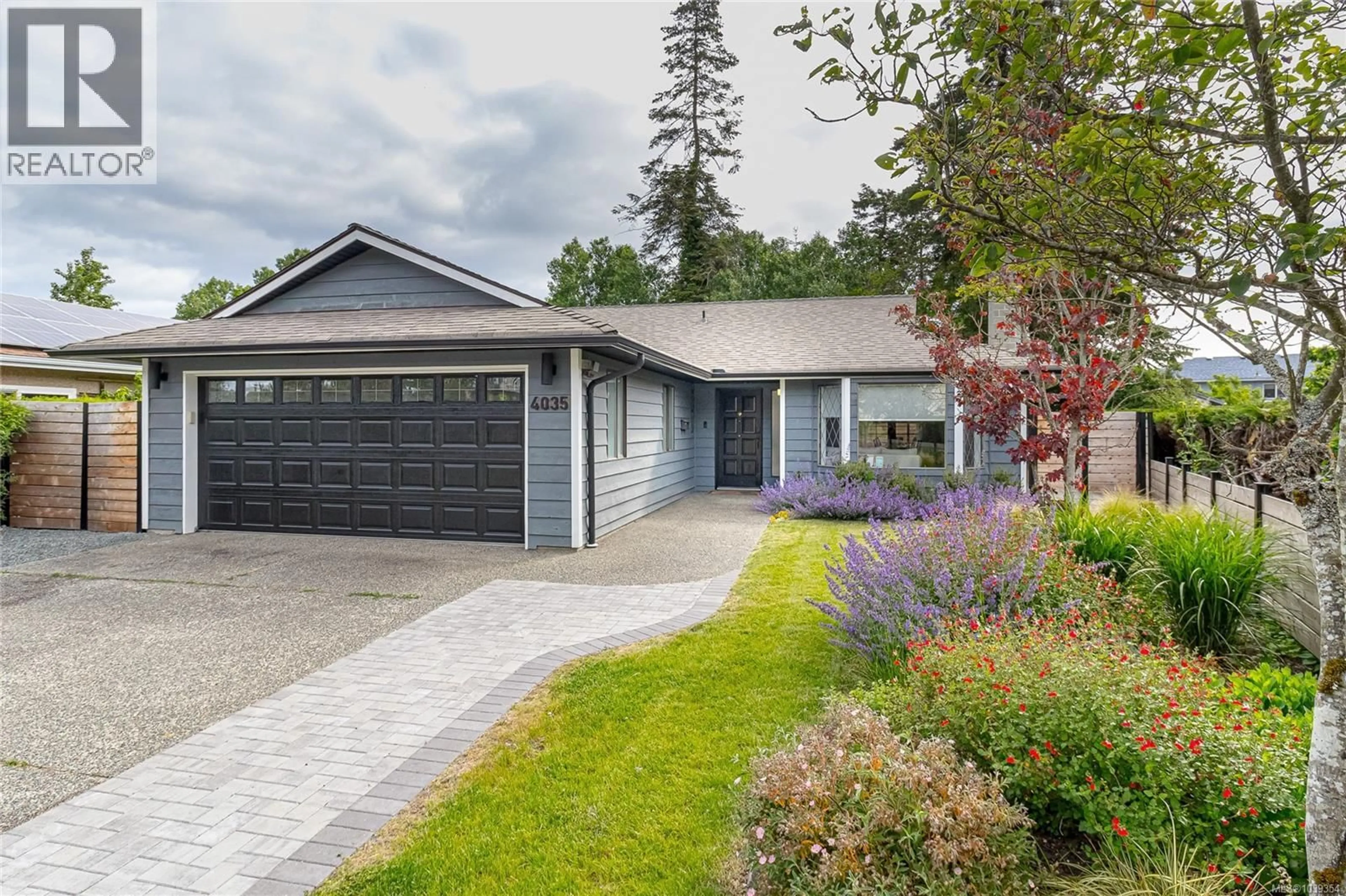 Home with vinyl exterior material, street for 4035 CENTURY ROAD, Saanich British Columbia V8X2E5