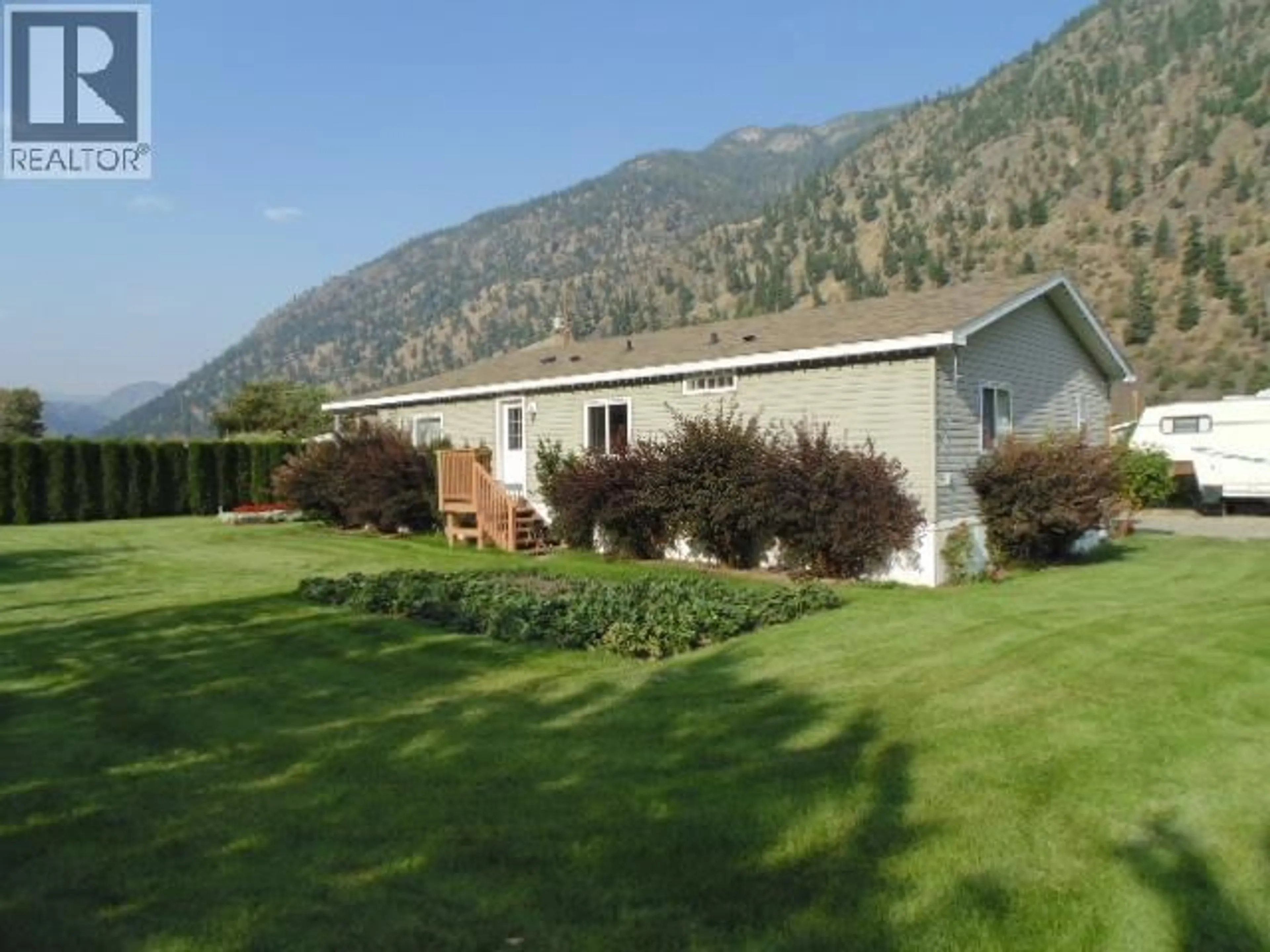 A pic from outside/outdoor area/front of a property/back of a property/a pic from drone, mountain view for 1526 MAIN STREET NORTH, Olalla British Columbia V0X1N6