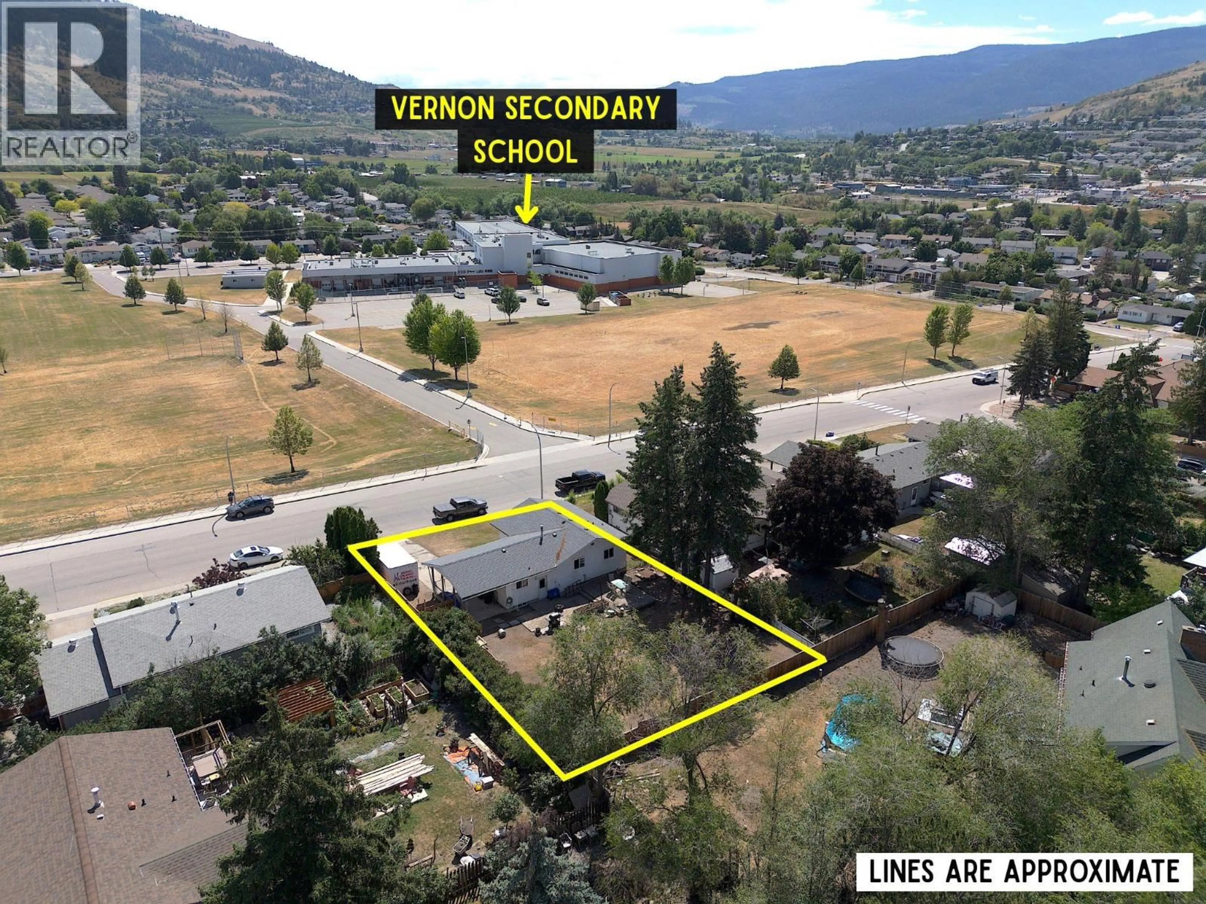 A pic from outside/outdoor area/front of a property/back of a property/a pic from drone, mountain view for 2306 18 STREET, Vernon British Columbia V1T3Z8