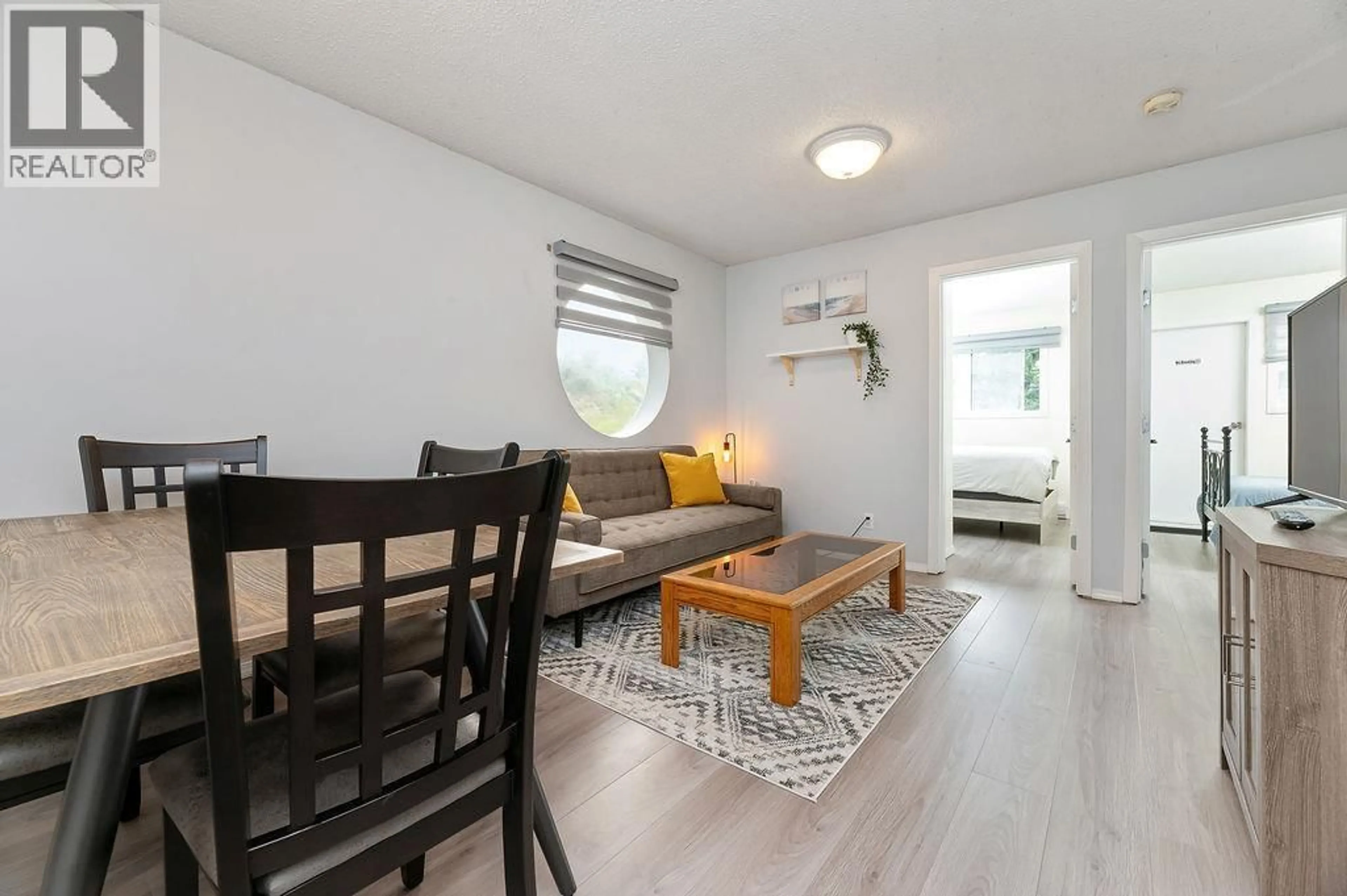 Living room with furniture, wood/laminate floor for 65 - 1309 11TH AVENUE, Invermere British Columbia V0A1K0