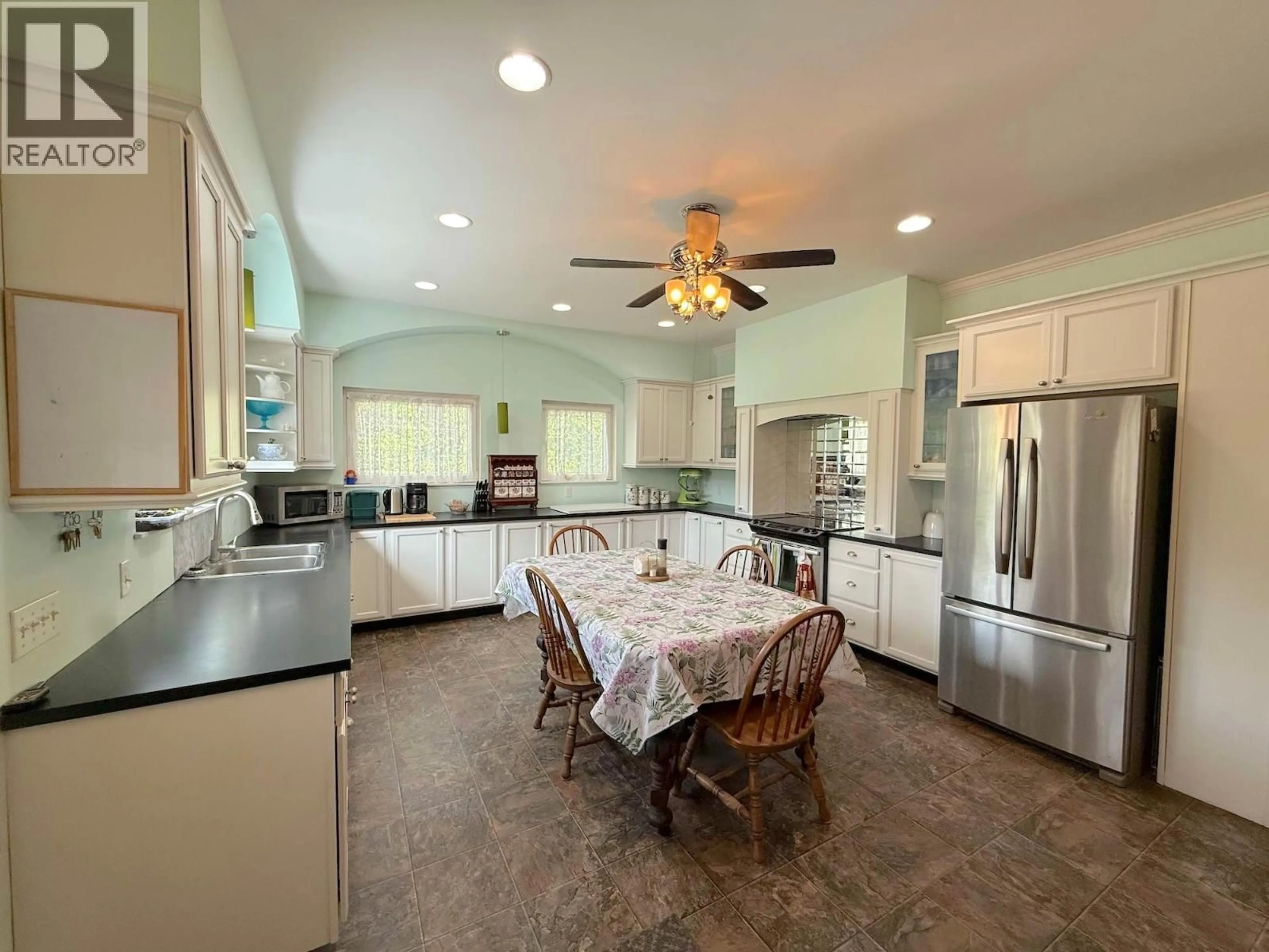 Open concept kitchen, ceramic/tile floor for 4240 VANCOUVER AVENUE EAST, Grand Forks British Columbia V0H1H5