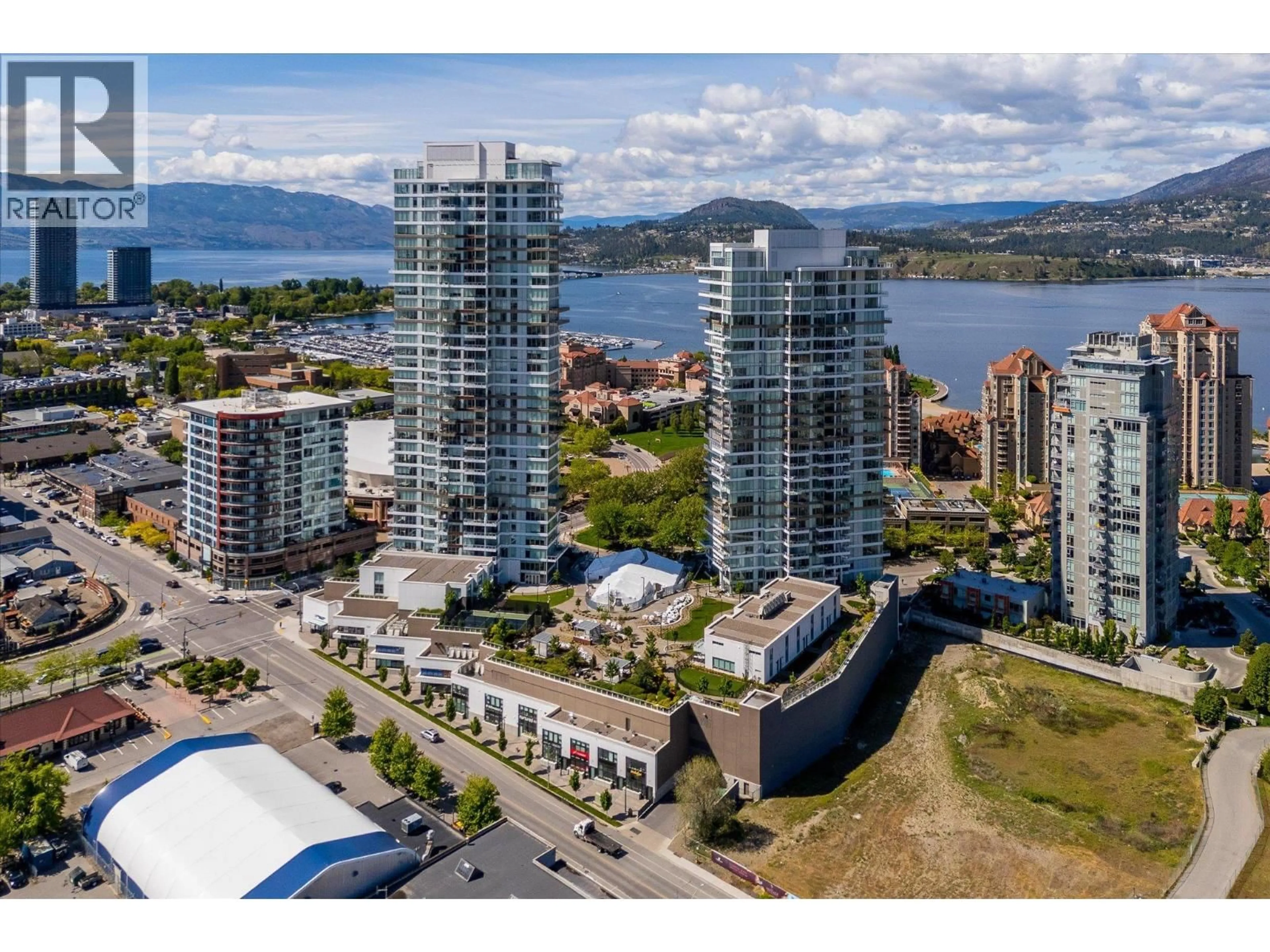 A pic from outside/outdoor area/front of a property/back of a property/a pic from drone, water/lake/river/ocean view for 2606 - 1191 SUNSET DRIVE, Kelowna British Columbia V1Y0J6