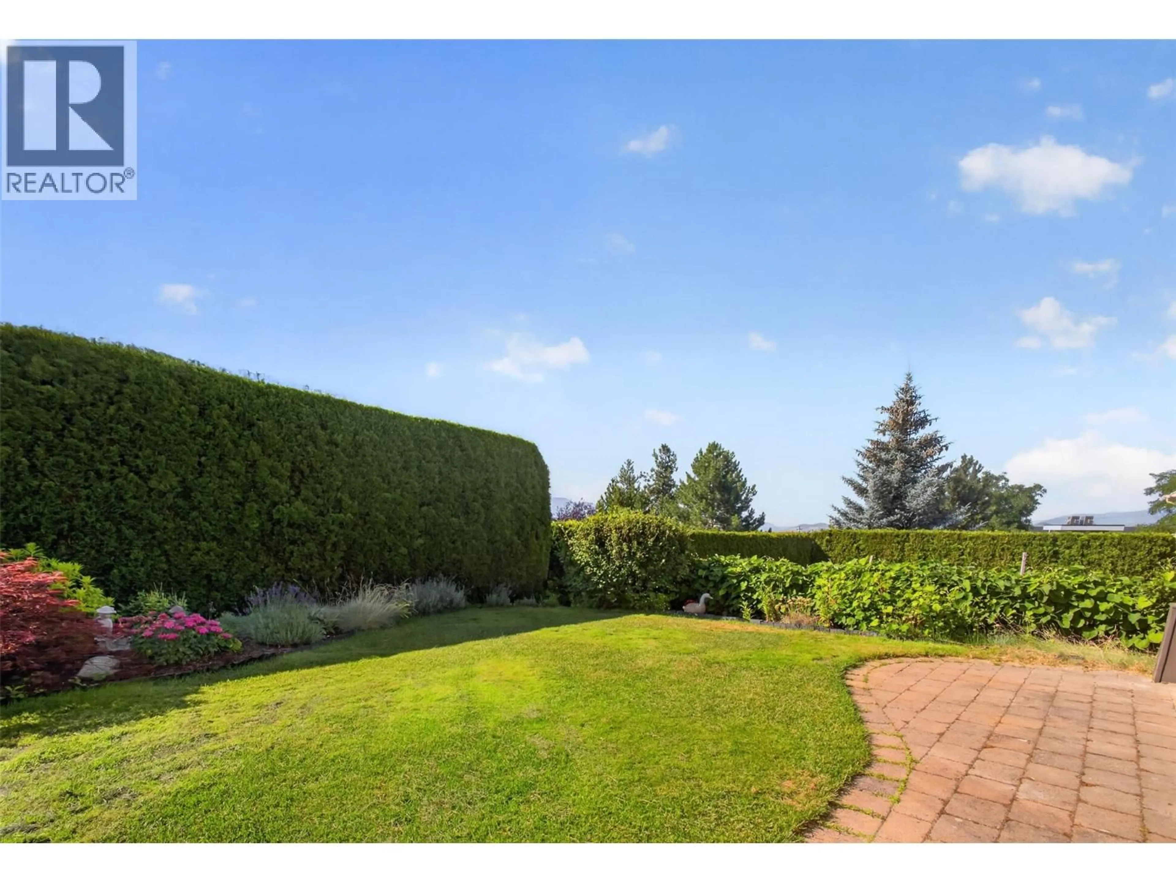 A pic from outside/outdoor area/front of a property/back of a property/a pic from drone, forest/trees view for 5034 SOUTH RIDGE DRIVE, Kelowna British Columbia V1W4W6