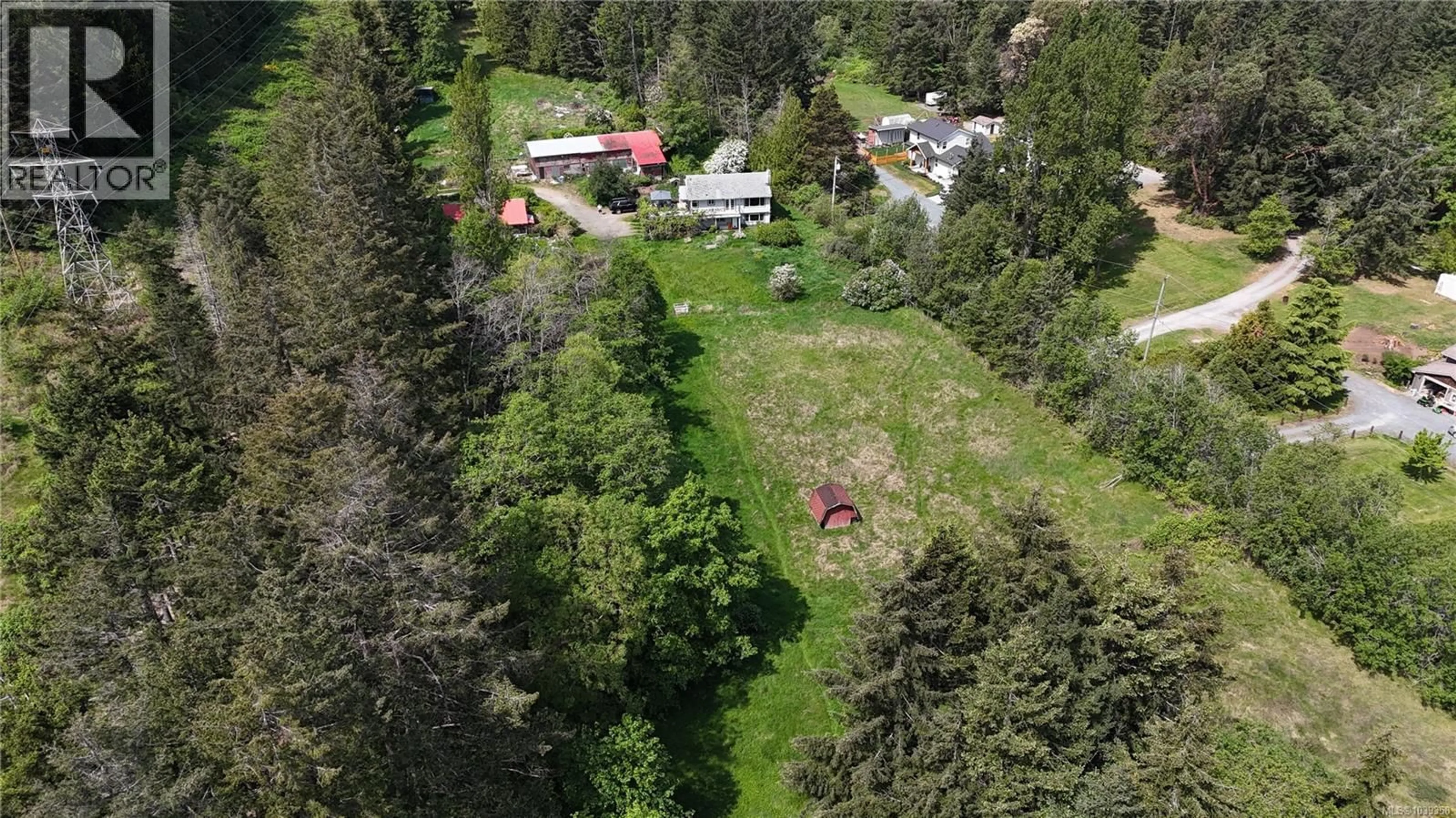 A pic from outside/outdoor area/front of a property/back of a property/a pic from drone, unknown for 6671 HARWOOD DRIVE, Lantzville British Columbia V0R2H0
