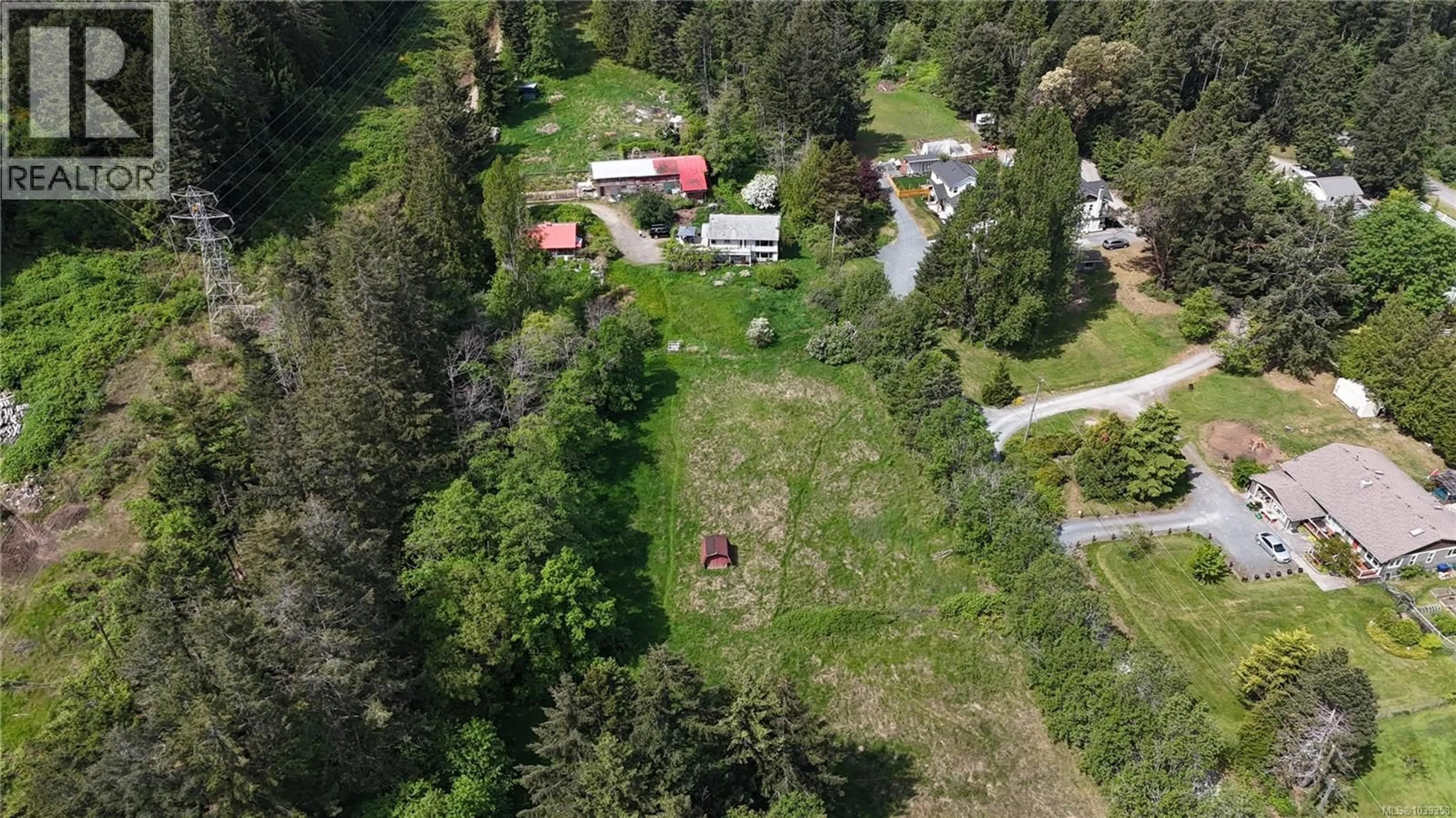 A pic from outside/outdoor area/front of a property/back of a property/a pic from drone, street for 6671 HARWOOD DRIVE, Lantzville British Columbia V0R2H0