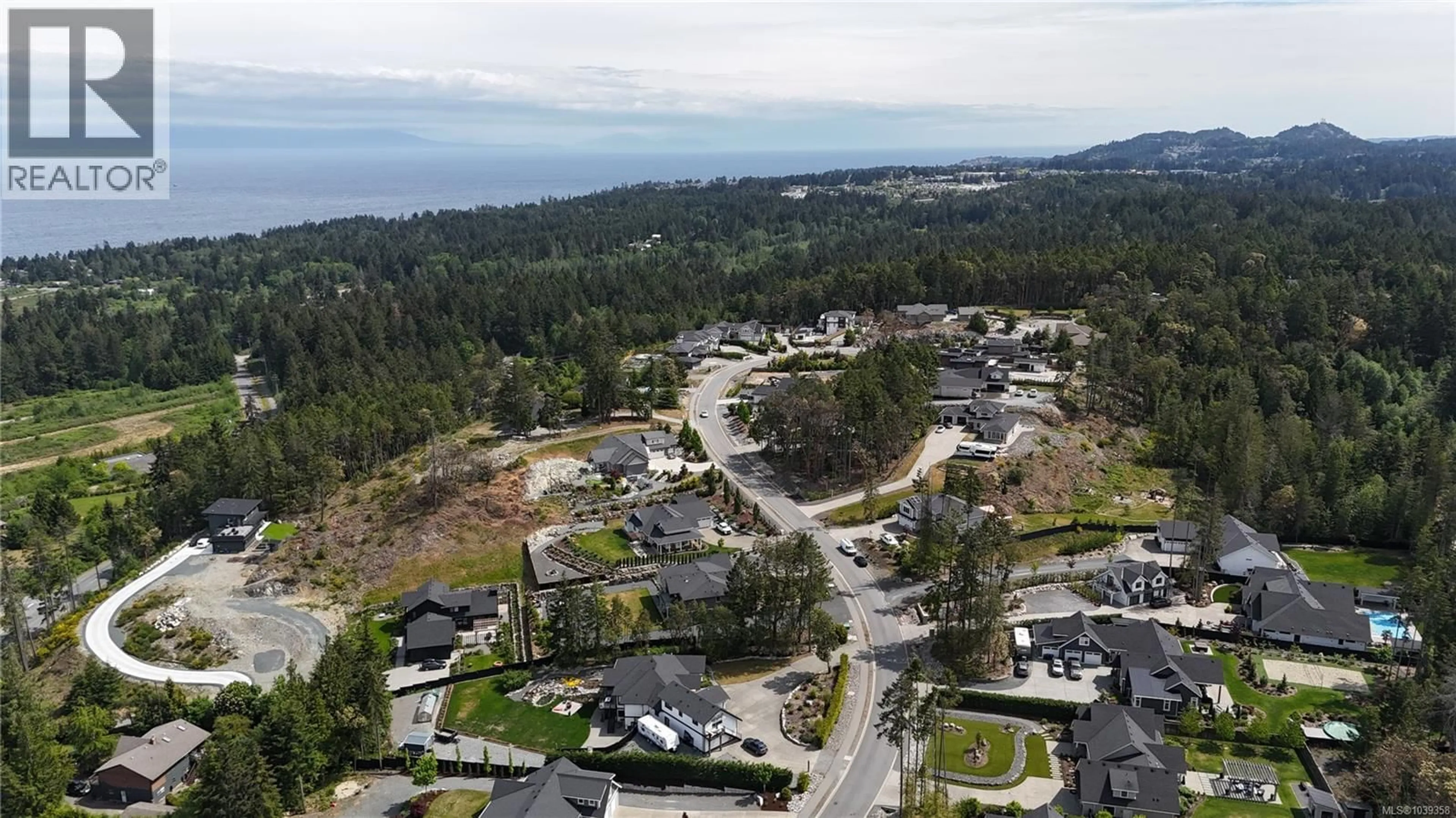 A pic from outside/outdoor area/front of a property/back of a property/a pic from drone, mountain view for 6671 HARWOOD DRIVE, Lantzville British Columbia V0R2H0