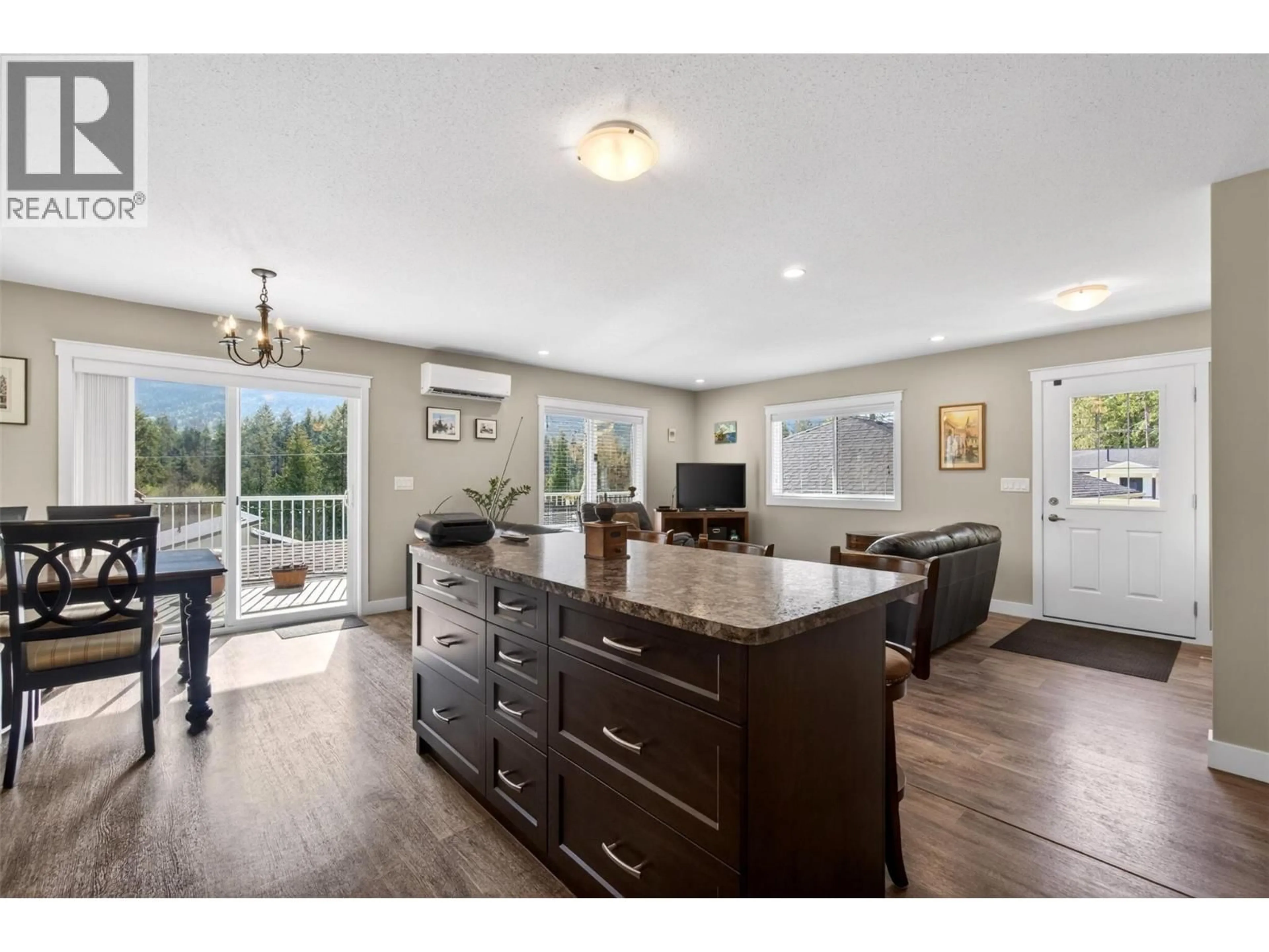 Open concept kitchen, wood/laminate floor for 6841 46 STREET NORTHEAST, Salmon Arm British Columbia V0E1K0
