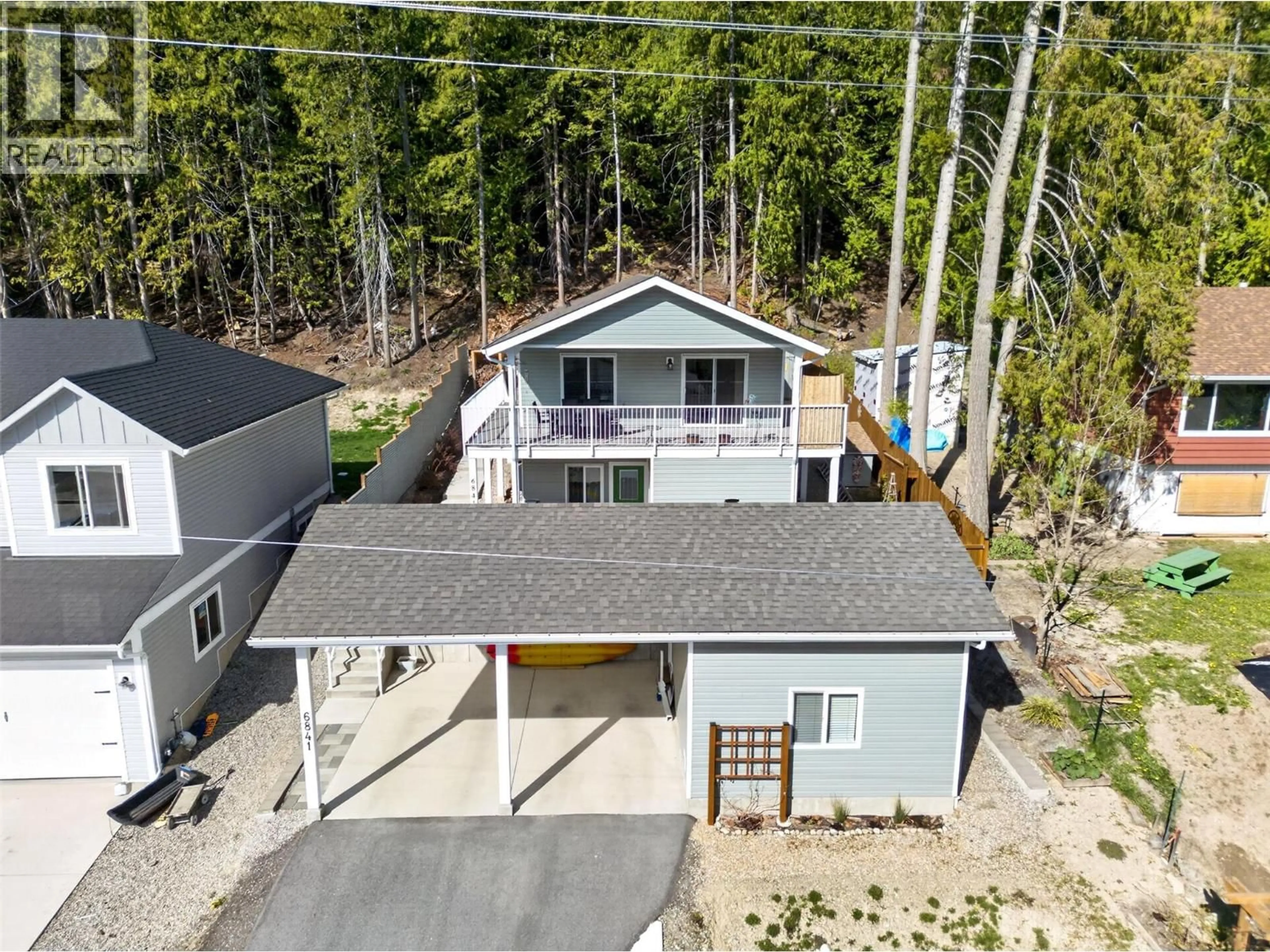 A pic from outside/outdoor area/front of a property/back of a property/a pic from drone, street for 6841 46 STREET NORTHEAST, Salmon Arm British Columbia V0E1K0