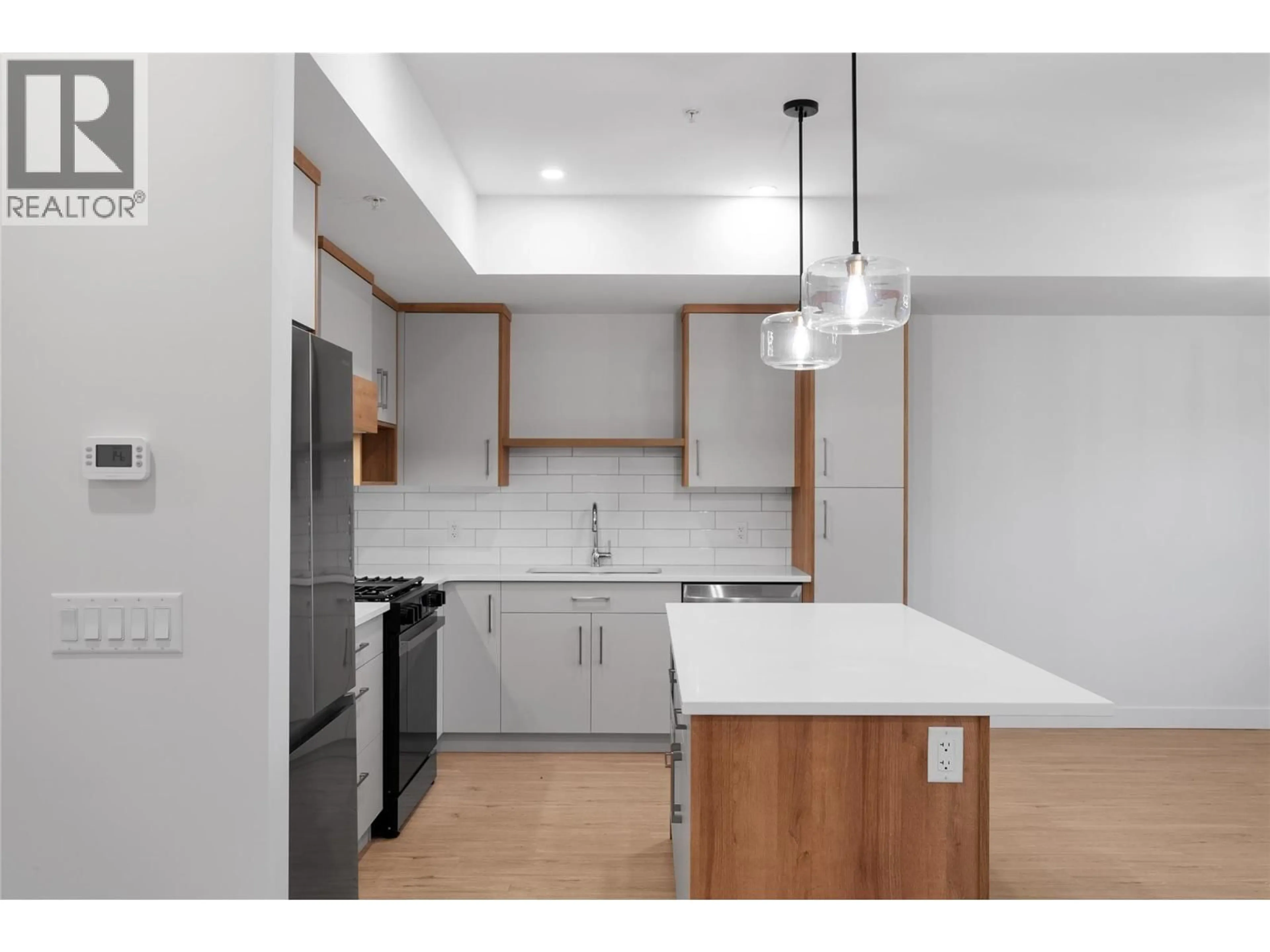 Standard kitchen, wood/laminate floor for 203 - 1844 QU'APPELLE BOULEVARD, Kamloops British Columbia V2E0E8