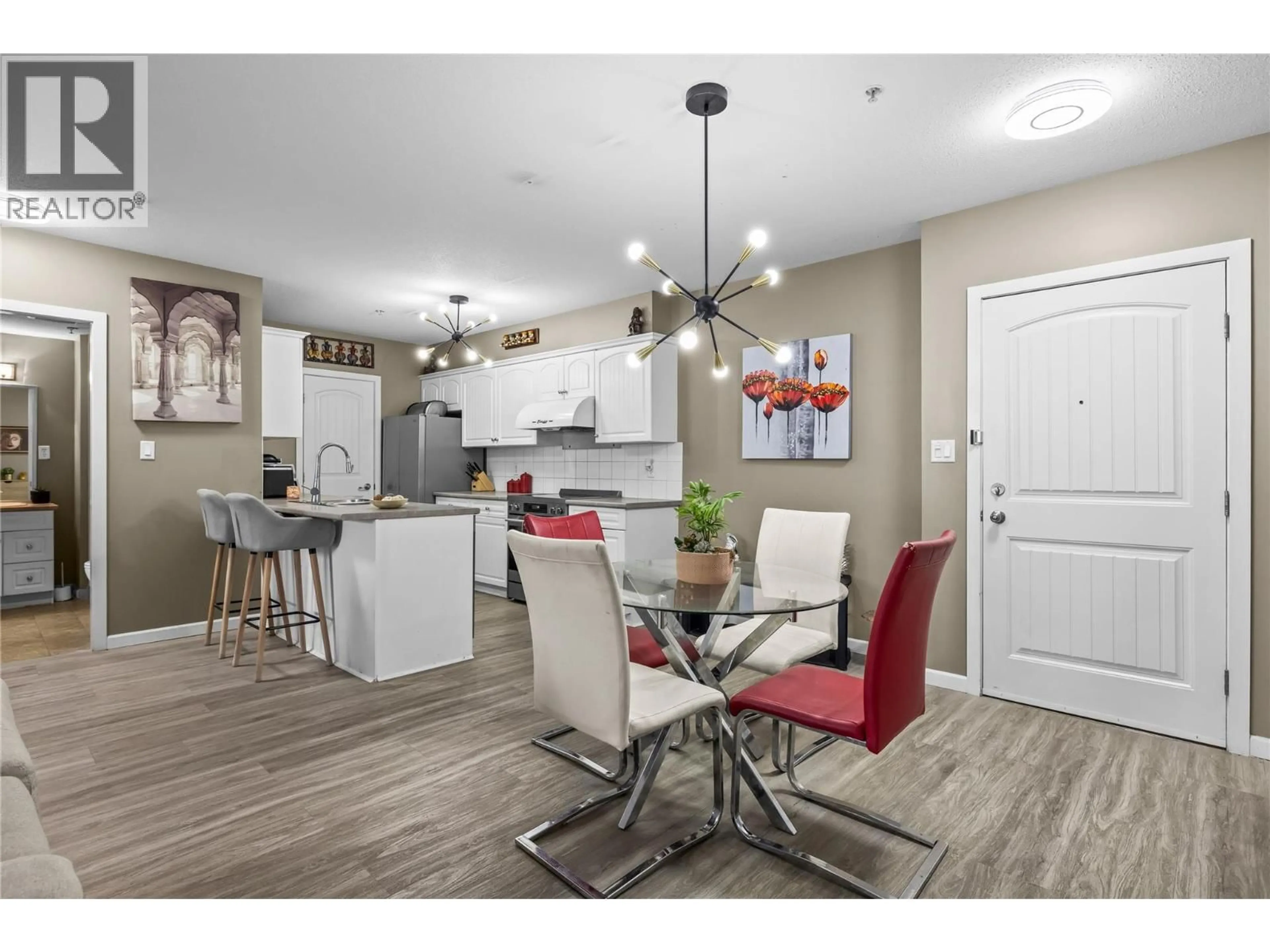 Open concept kitchen, wood/laminate floor for 205 - 140 ASHER ROAD, Kelowna British Columbia V1X3H6