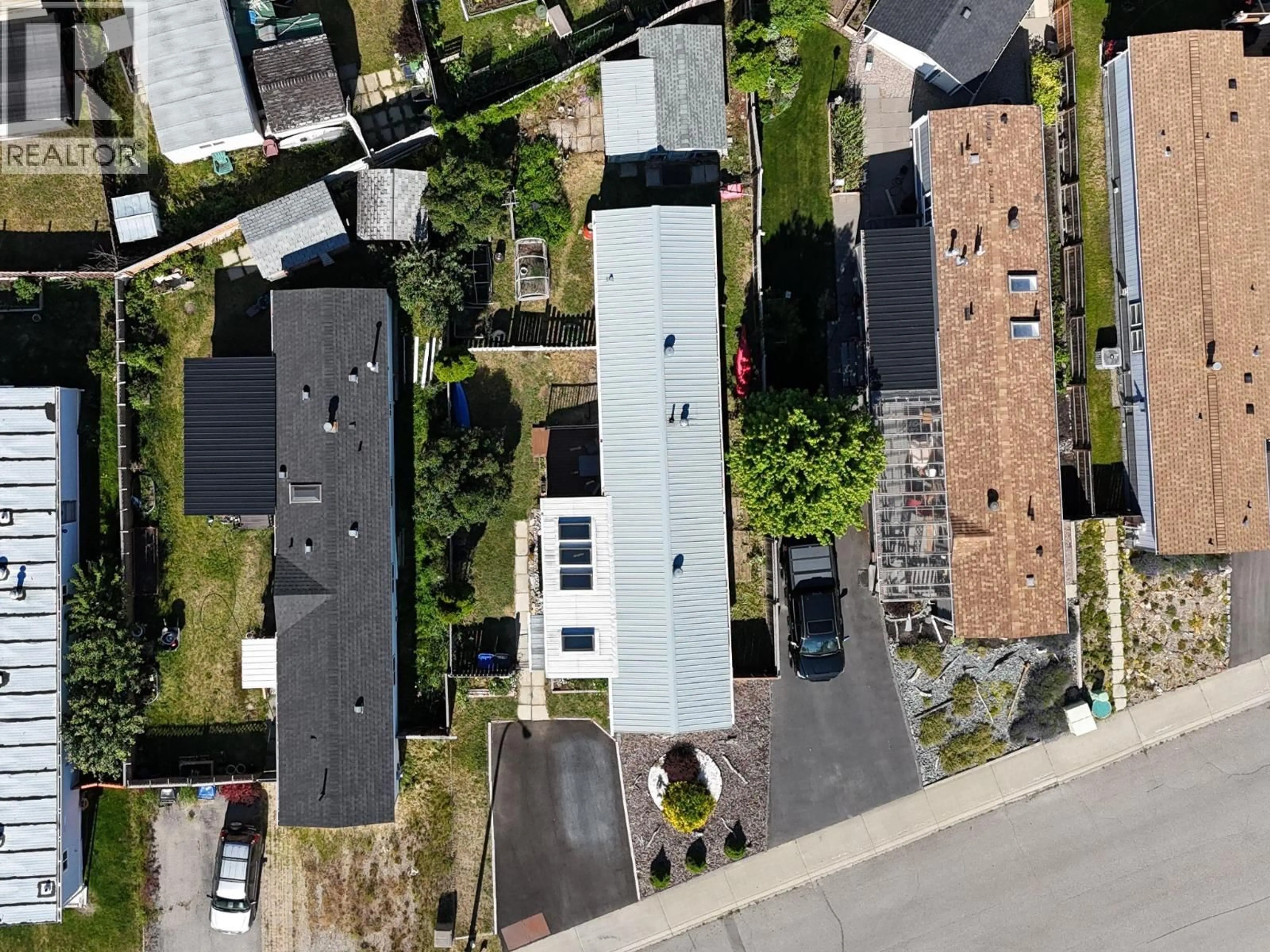 A pic from outside/outdoor area/front of a property/back of a property/a pic from drone, street for 1969 KOKANEE CRESCENT NORTH, Cranbrook British Columbia V1C5X6