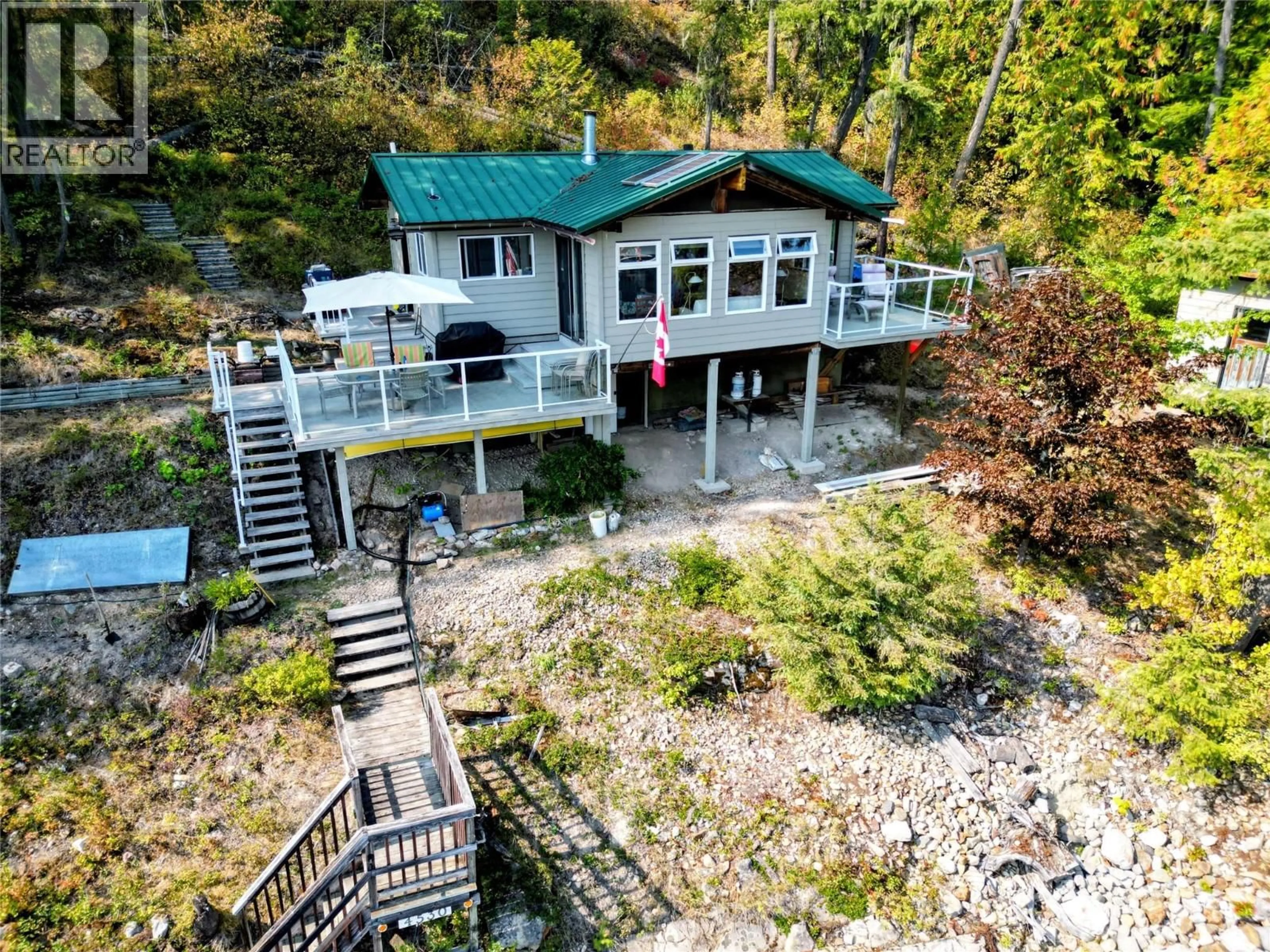 A pic from outside/outdoor area/front of a property/back of a property/a pic from drone, water/lake/river/ocean view for 4530 BOAT ACCESS WEST SIDE OTHER, Christina Lake British Columbia