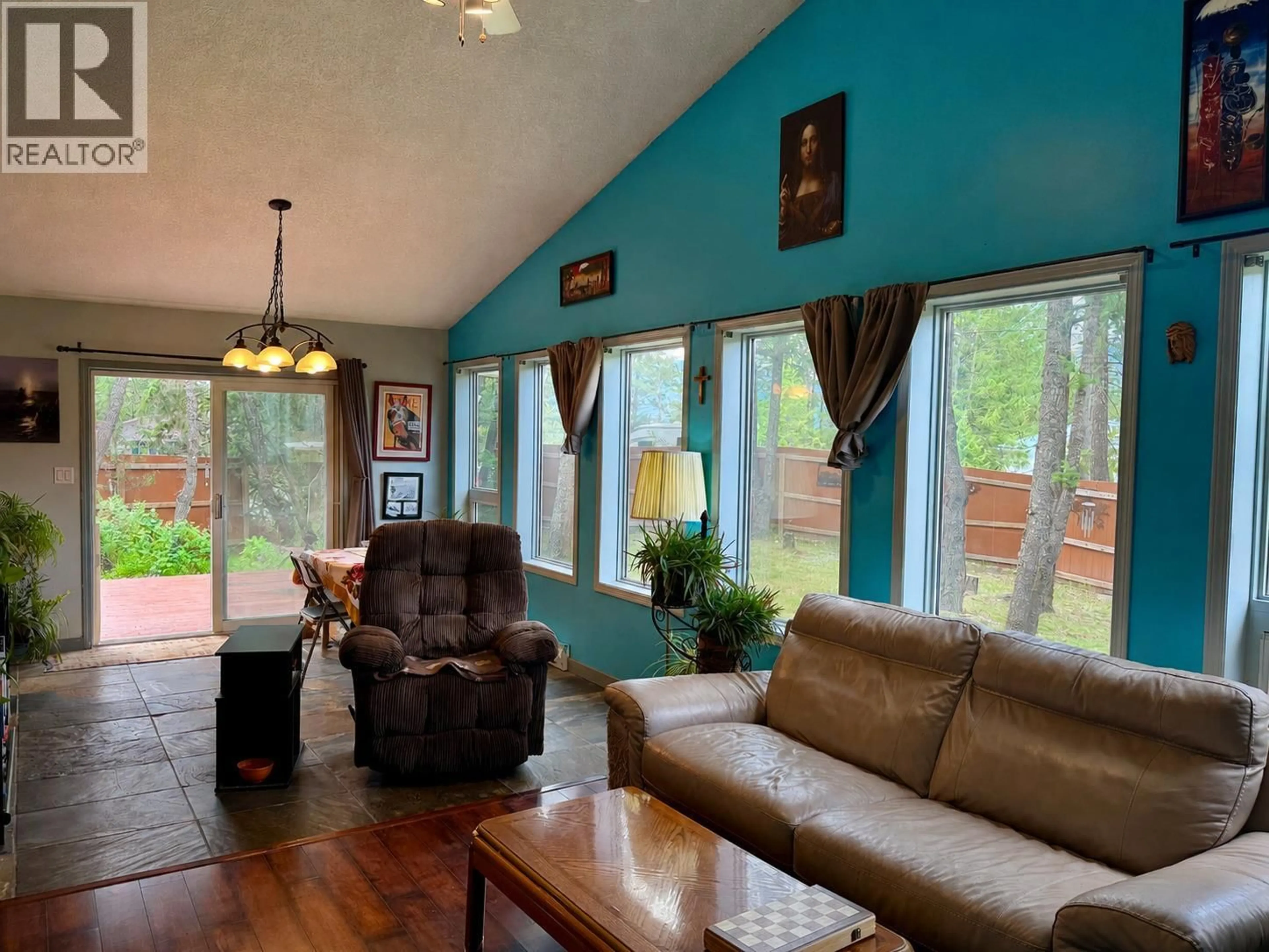 Living room with furniture, wood/laminate floor for 4949 LUXOR CREEK ROAD, Edgewater British Columbia V0A1B0