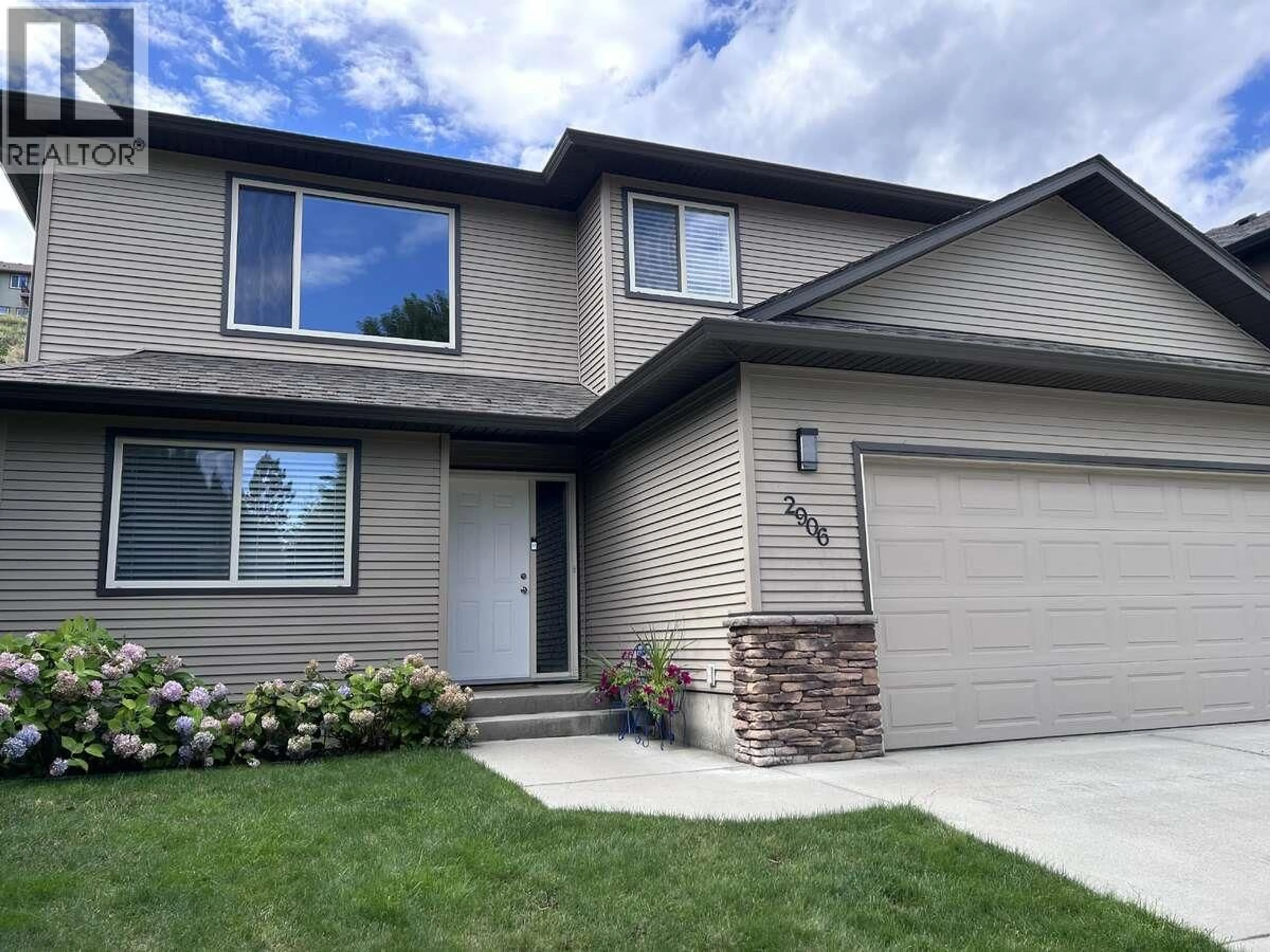 Home with vinyl exterior material, street for 2906 BENTLEY ROAD, West Kelowna British Columbia V4T3B3