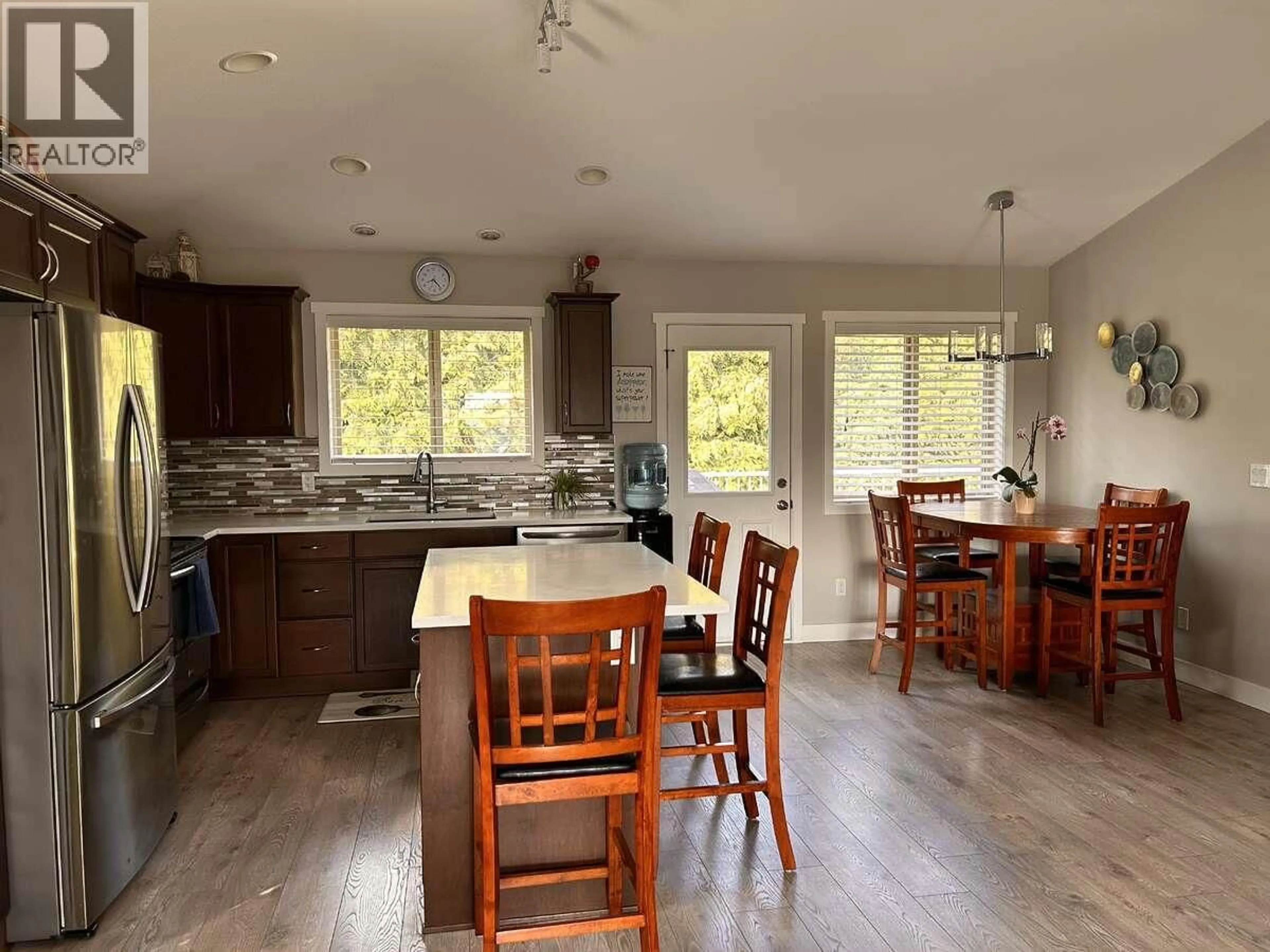 Open concept kitchen, wood/laminate floor for 2906 BENTLEY ROAD, West Kelowna British Columbia V4T3B3