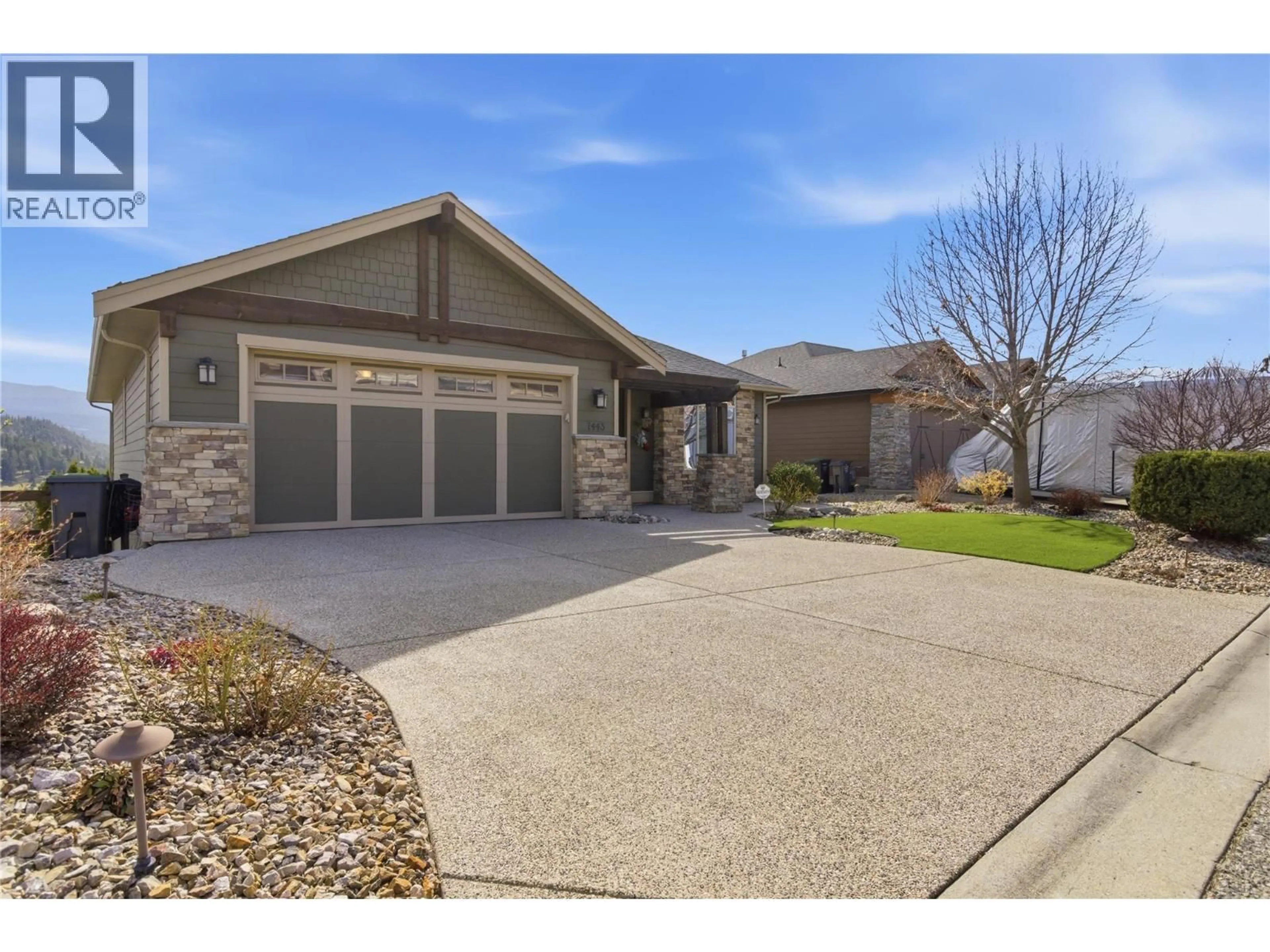 Home with brick exterior material, street for 1443 WILMOT AVENUE, Kelowna British Columbia V1P1N3