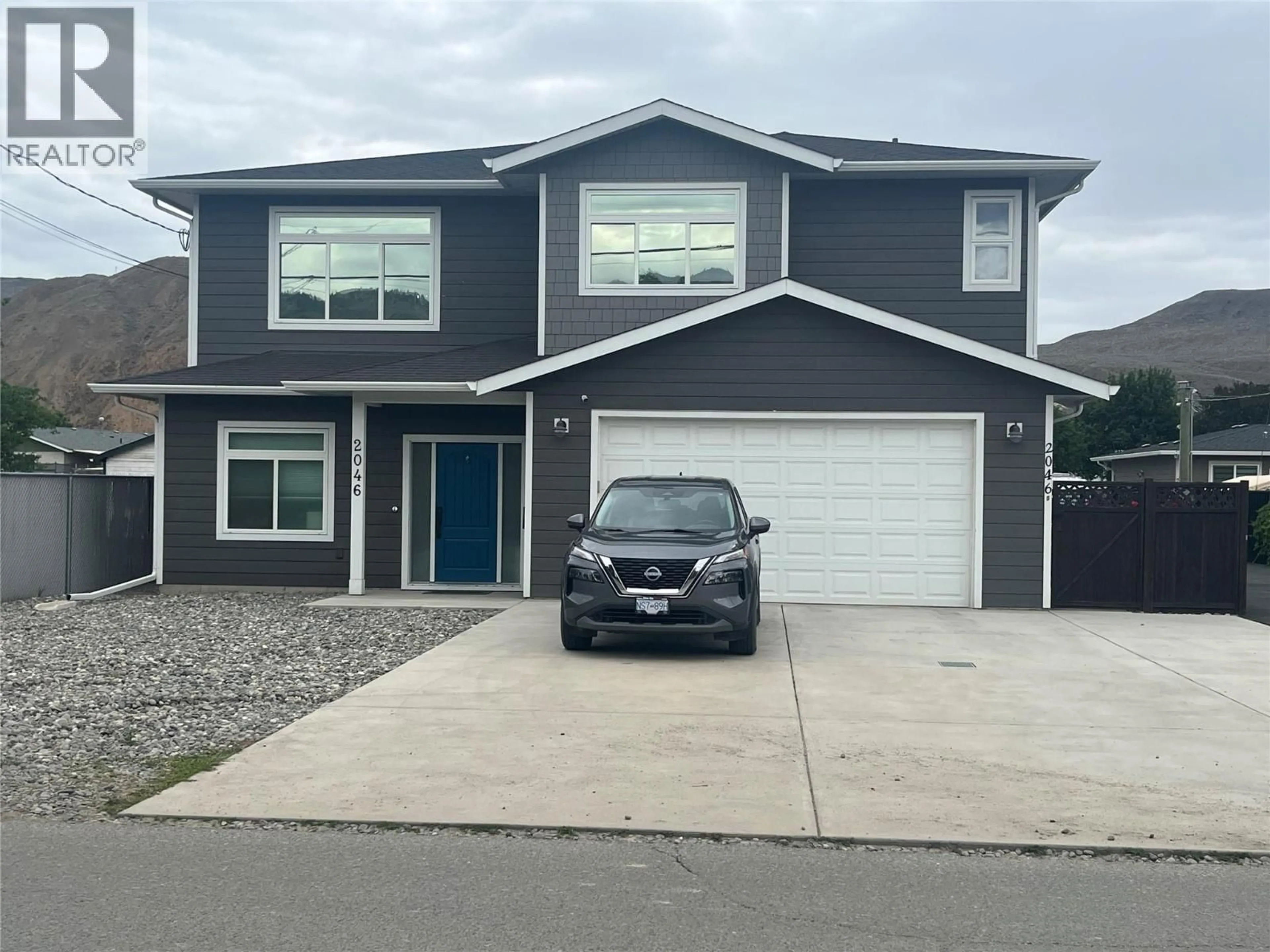 Home with vinyl exterior material, street for 2046 SUNNYCREST AVENUE, Kamloops British Columbia V2B4M1