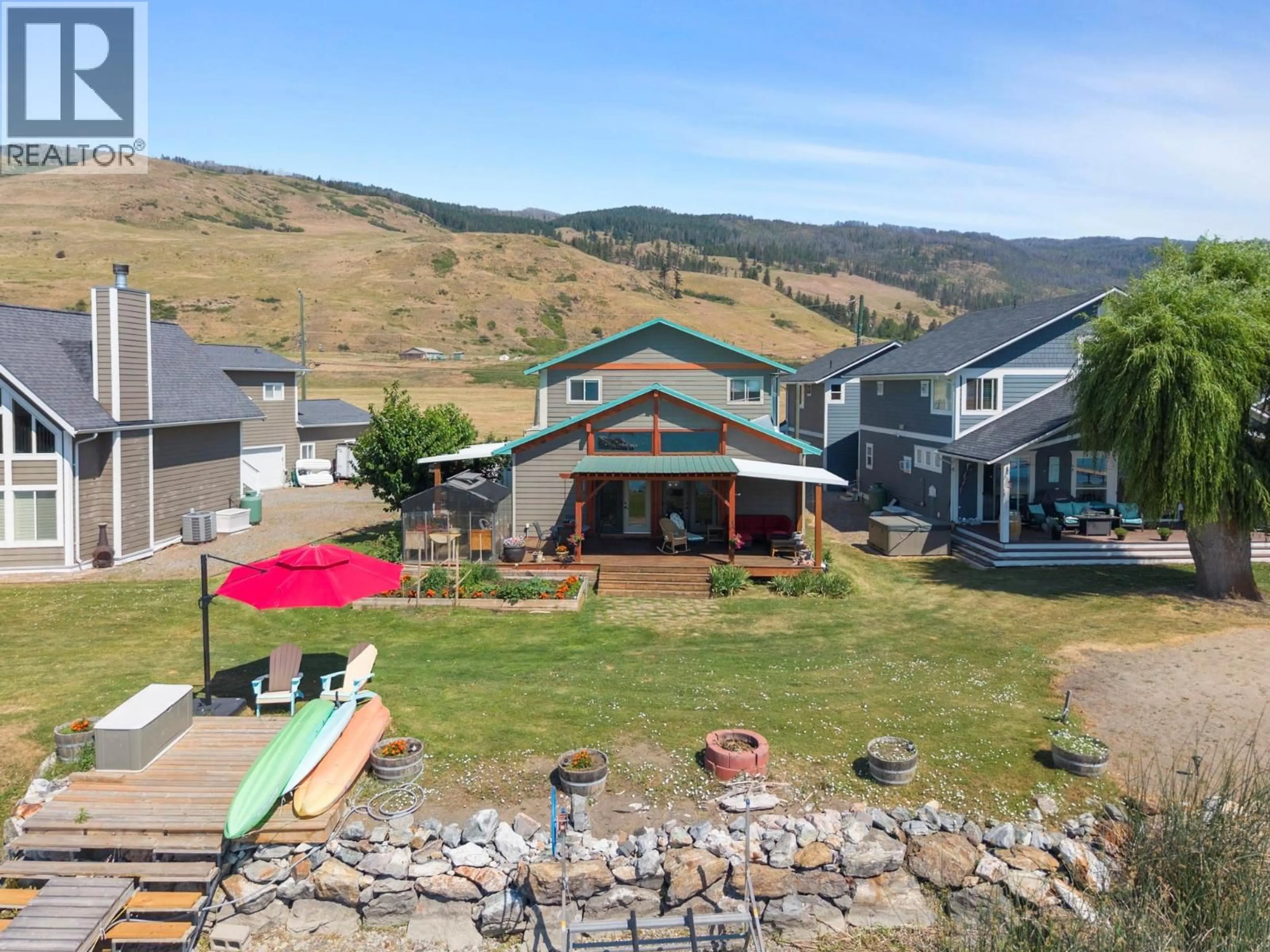 A pic from outside/outdoor area/front of a property/back of a property/a pic from drone, mountain view for 17 MARY'S EMERALD BAY ROAD, Vernon British Columbia V1H2A7