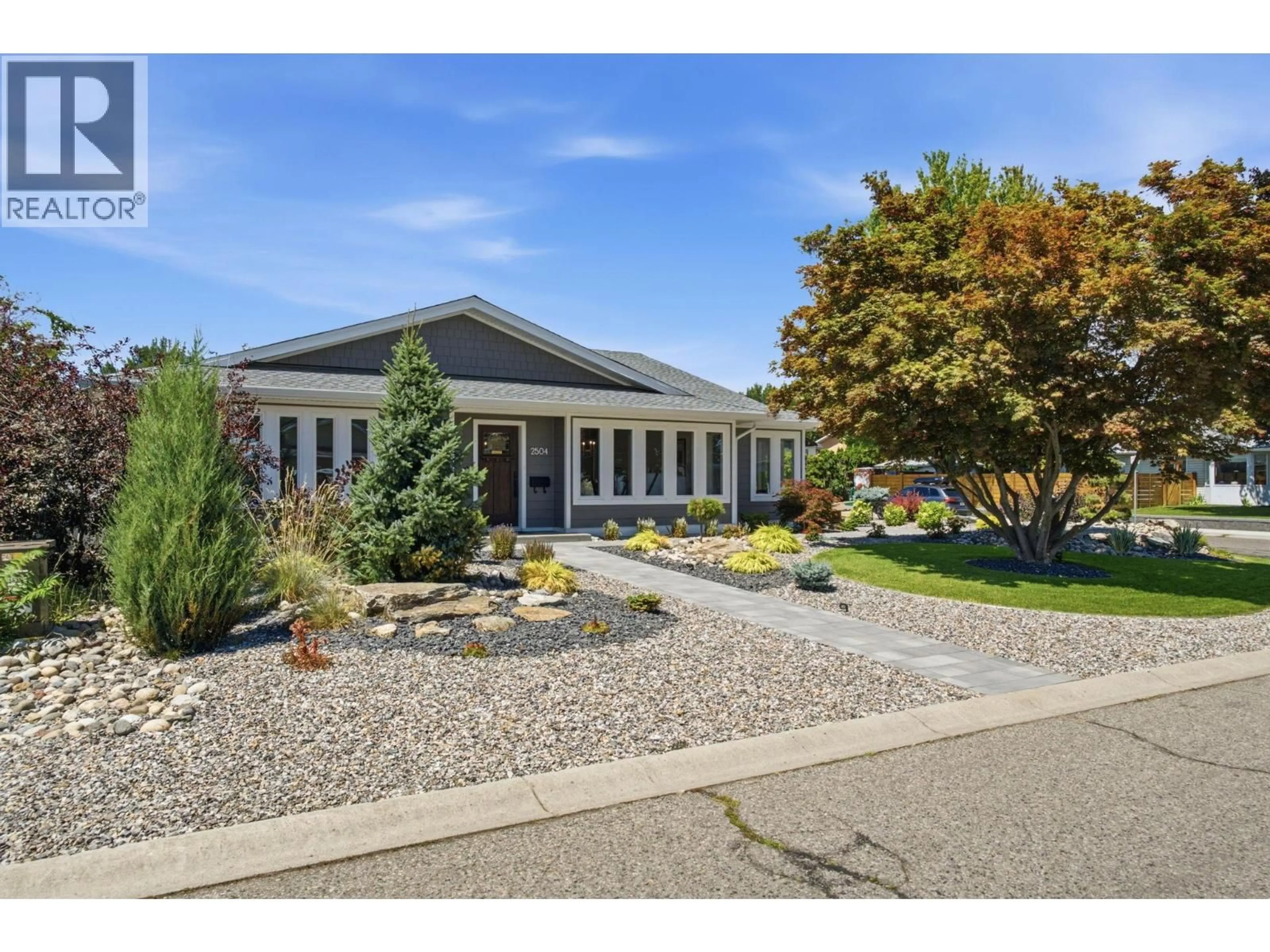 Home with vinyl exterior material, unknown for 2504 RHONDDA CRESCENT, Kelowna British Columbia V1Y8T5