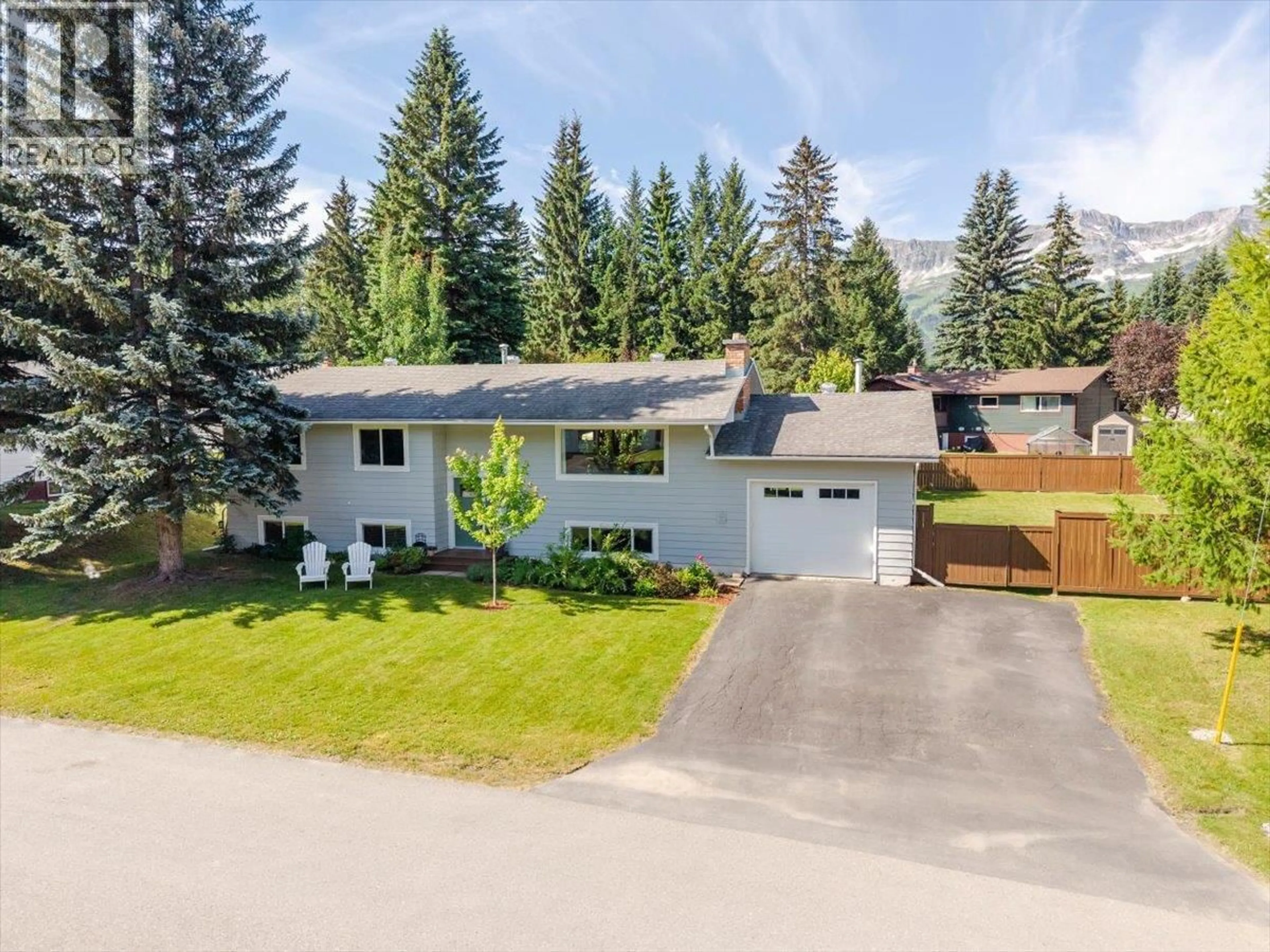 A pic from outside/outdoor area/front of a property/back of a property/a pic from drone, street for 22 ELKVIEW CRESCENT, Fernie British Columbia V0B1M3