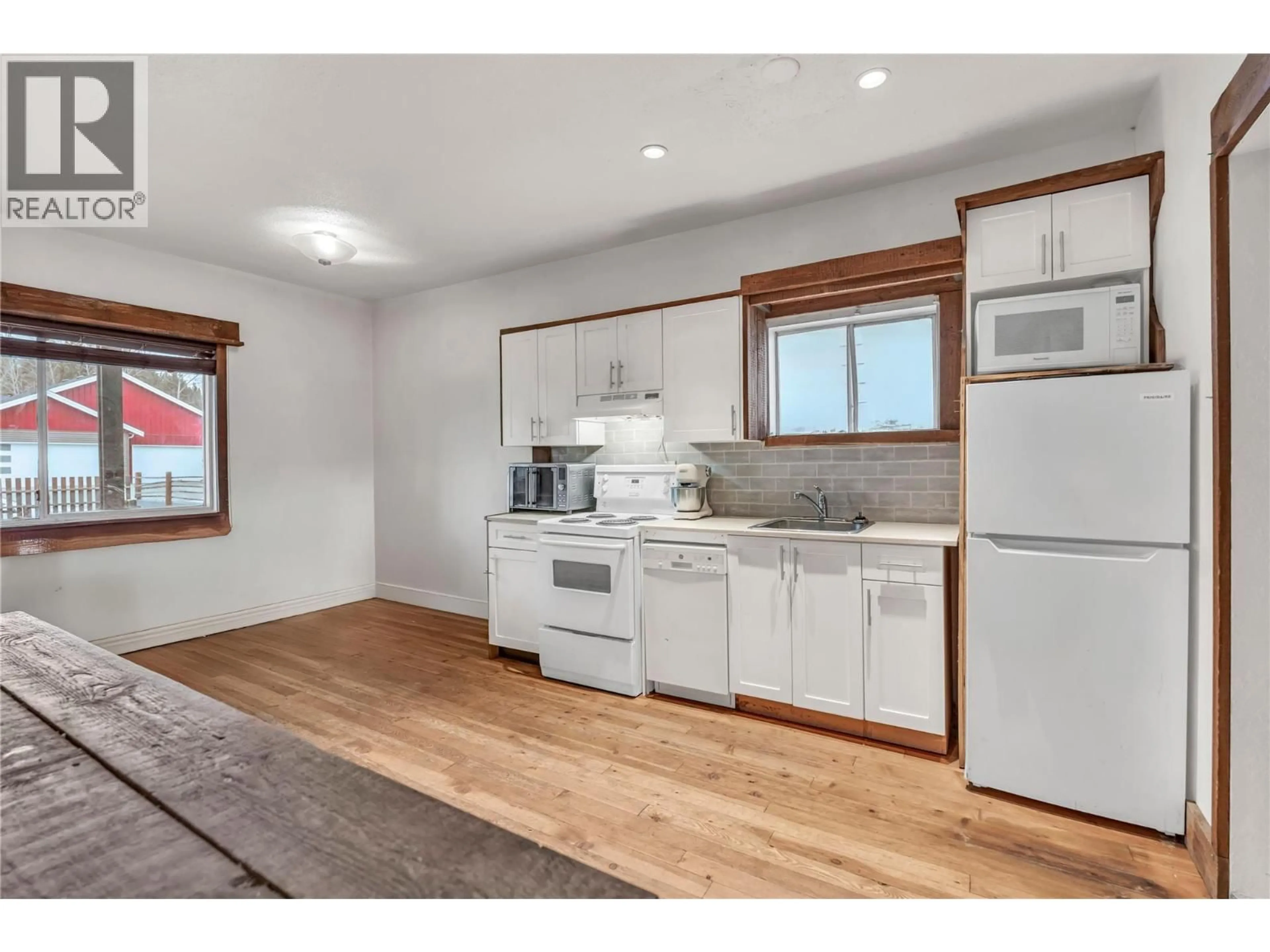 Open concept kitchen, wood/laminate floor for 511 SIMILKAMEEN AVENUE, Princeton British Columbia V0X1W0
