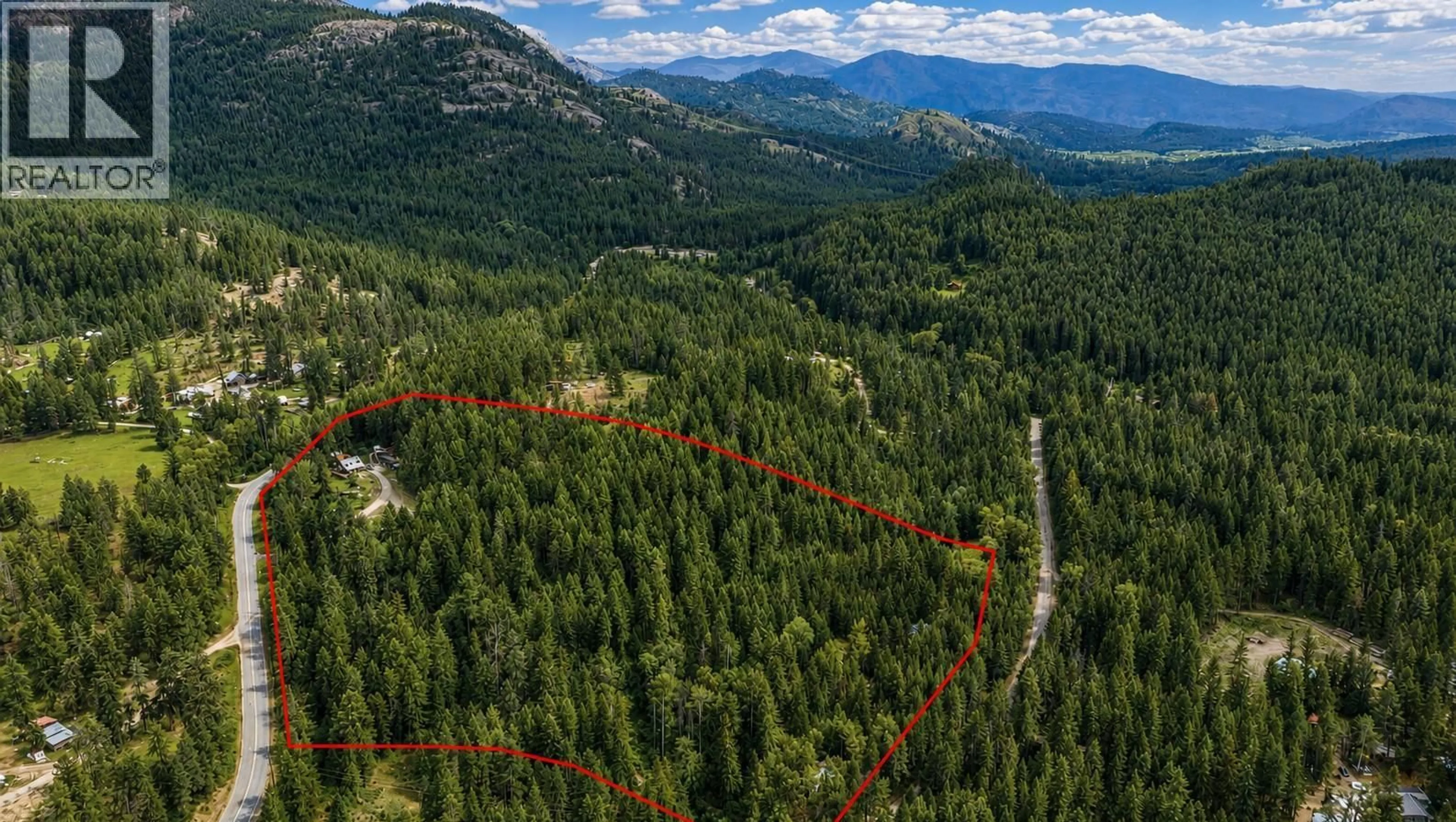 A pic from outside/outdoor area/front of a property/back of a property/a pic from drone, forest/trees view for 10625 GRANBY ROAD, Grand Forks British Columbia V0H1H1