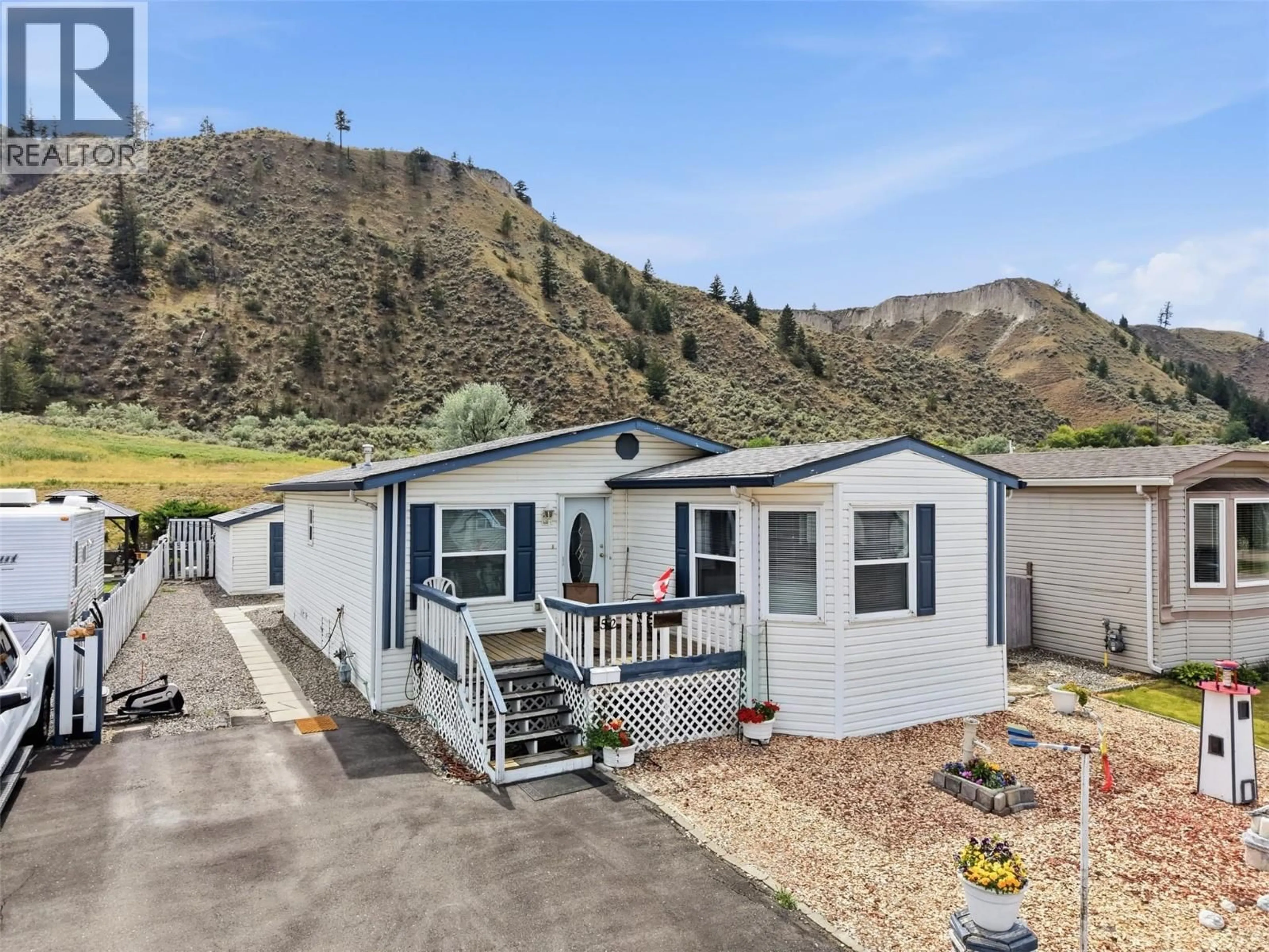 A pic from outside/outdoor area/front of a property/back of a property/a pic from drone, mountain view for 52 - 7545 DALLAS DRIVE, Kamloops British Columbia V2C6X8