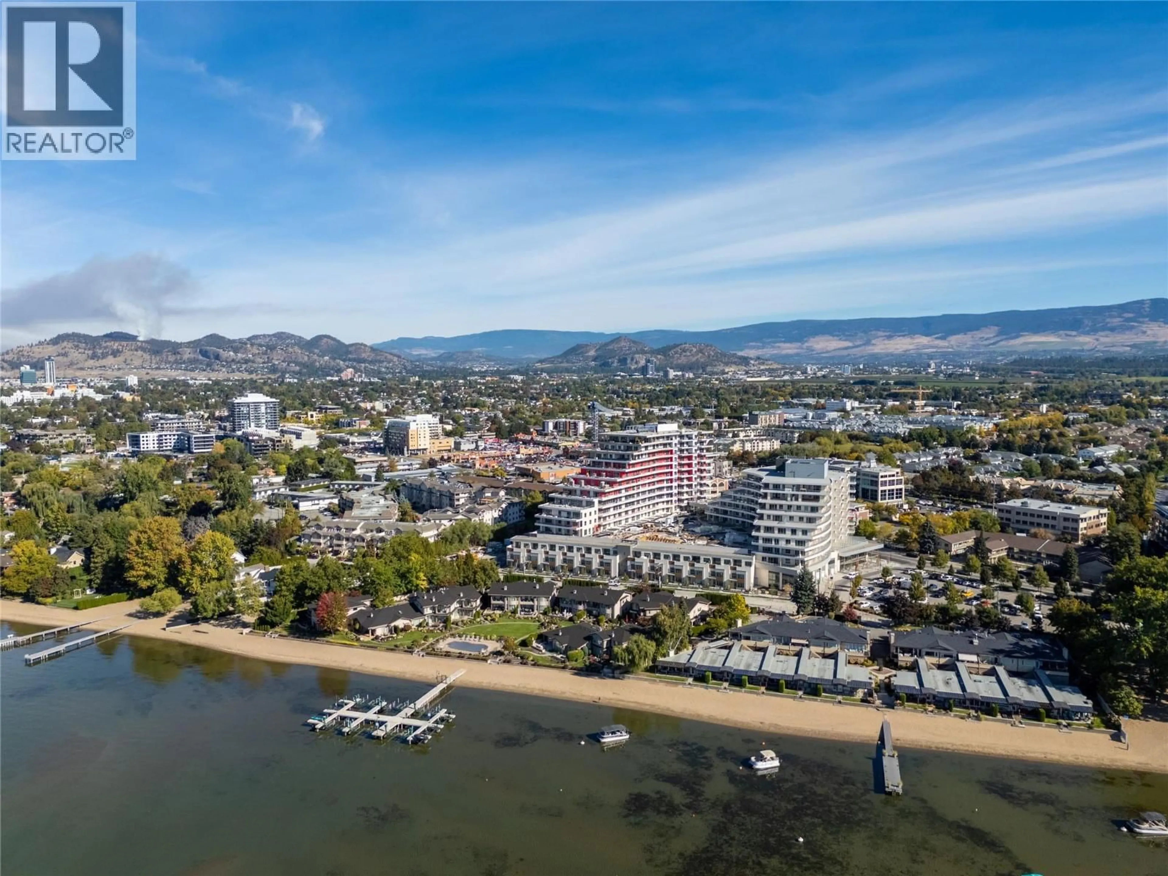 A pic from outside/outdoor area/front of a property/back of a property/a pic from drone, water/lake/river/ocean view for 306 - 3340 LAKESHORE DRIVE, Kelowna British Columbia V1W0H6