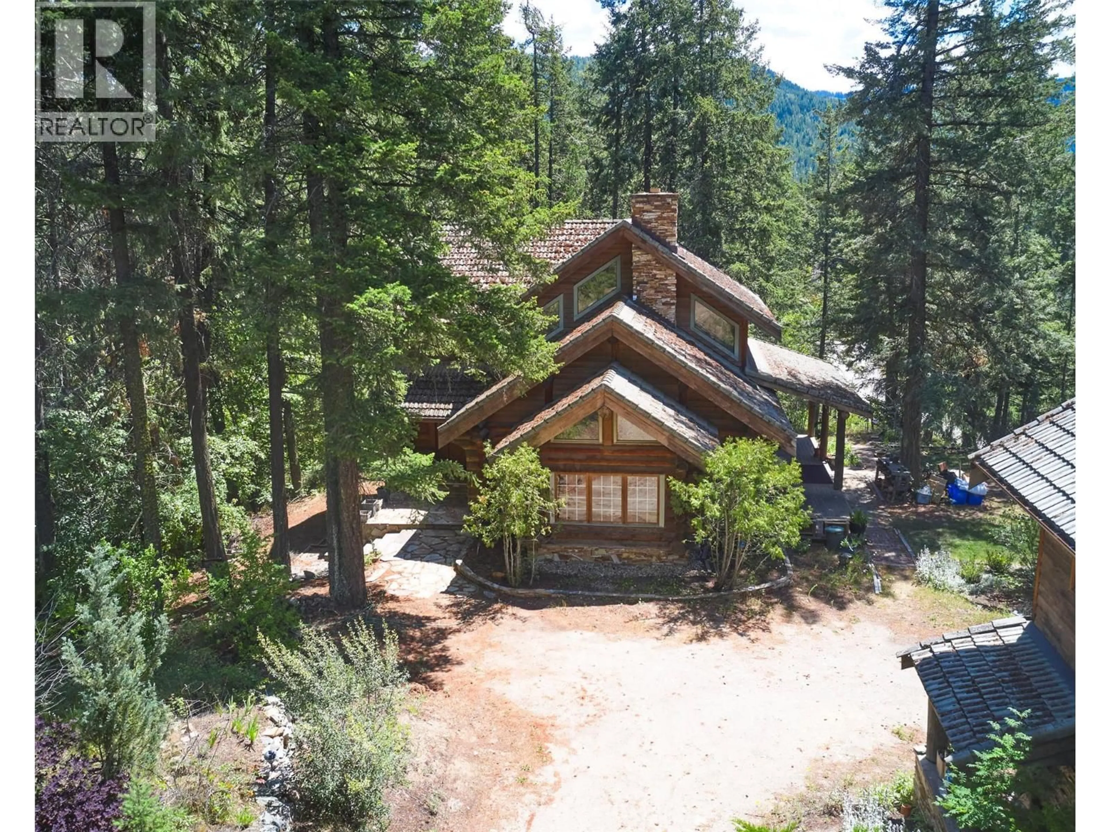 A pic from outside/outdoor area/front of a property/back of a property/a pic from drone, unknown for 7804 SILVER STAR ROAD, Vernon British Columbia V1B3N2