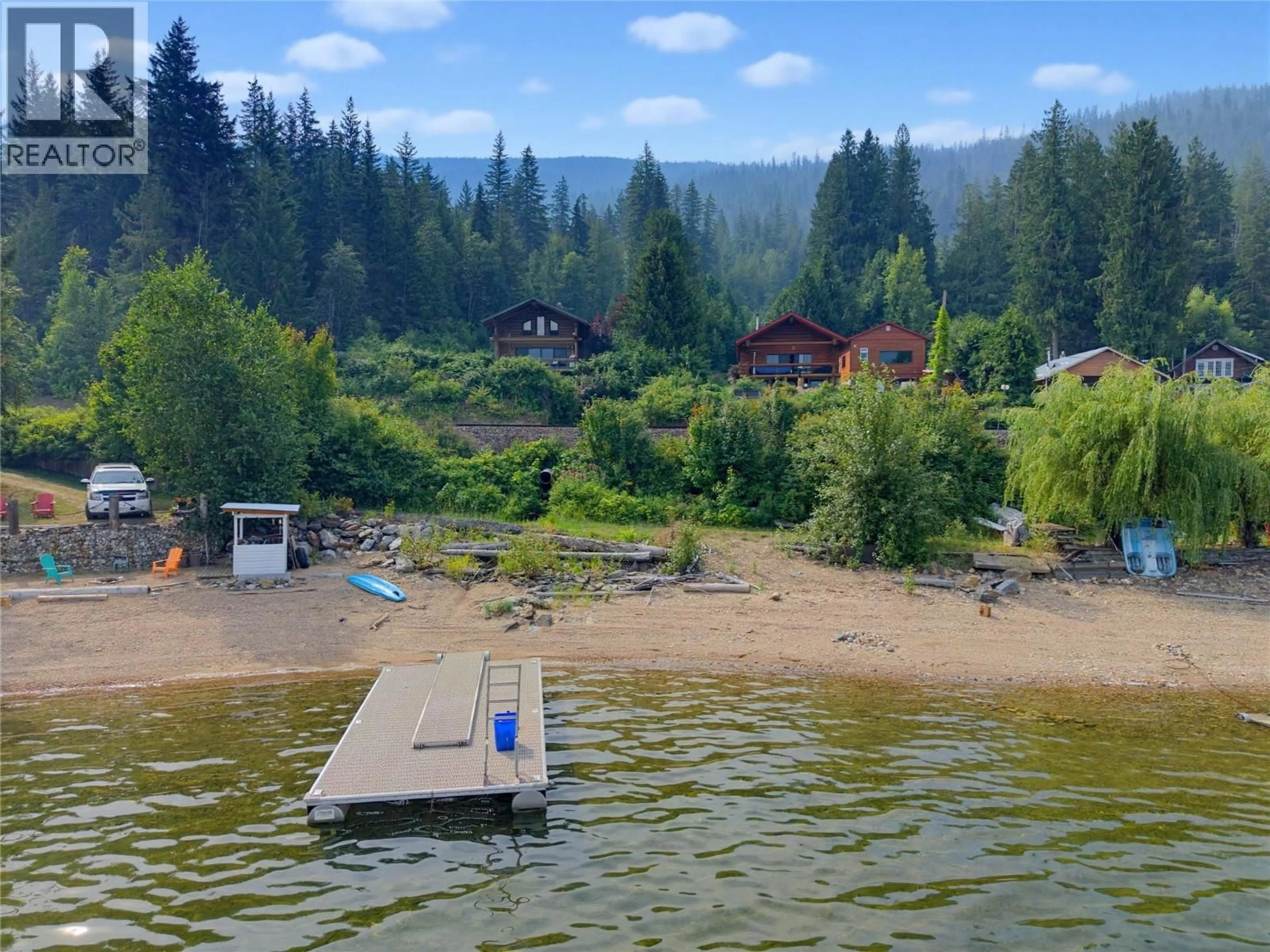 A pic from outside/outdoor area/front of a property/back of a property/a pic from drone, water/lake/river/ocean view for 43 - 1249 BERNIE ROAD, Sicamous British Columbia V0E2K0