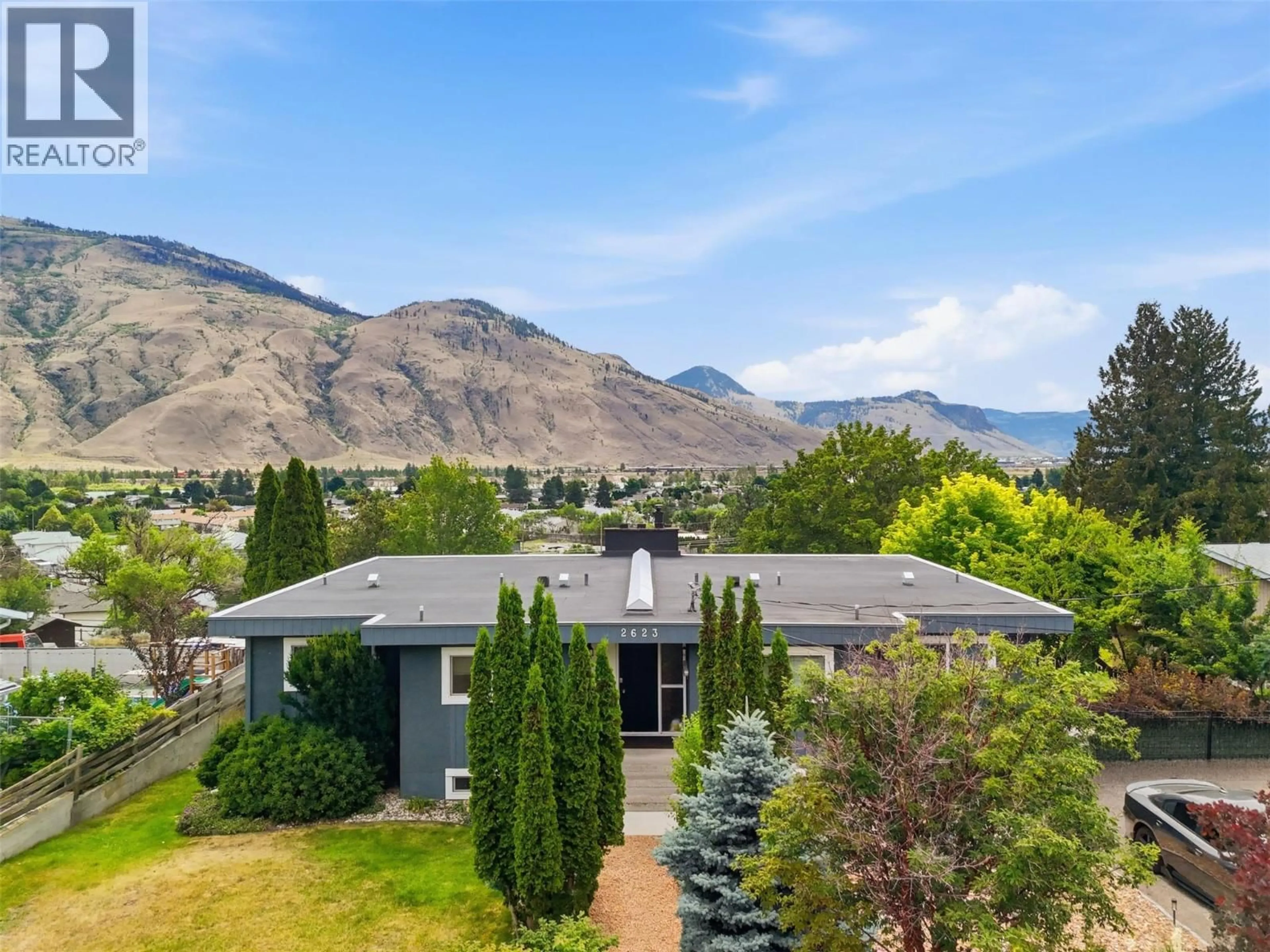 A pic from outside/outdoor area/front of a property/back of a property/a pic from drone, mountain view for 2623 PARKVIEW DRIVE, Kamloops British Columbia V2B7J5
