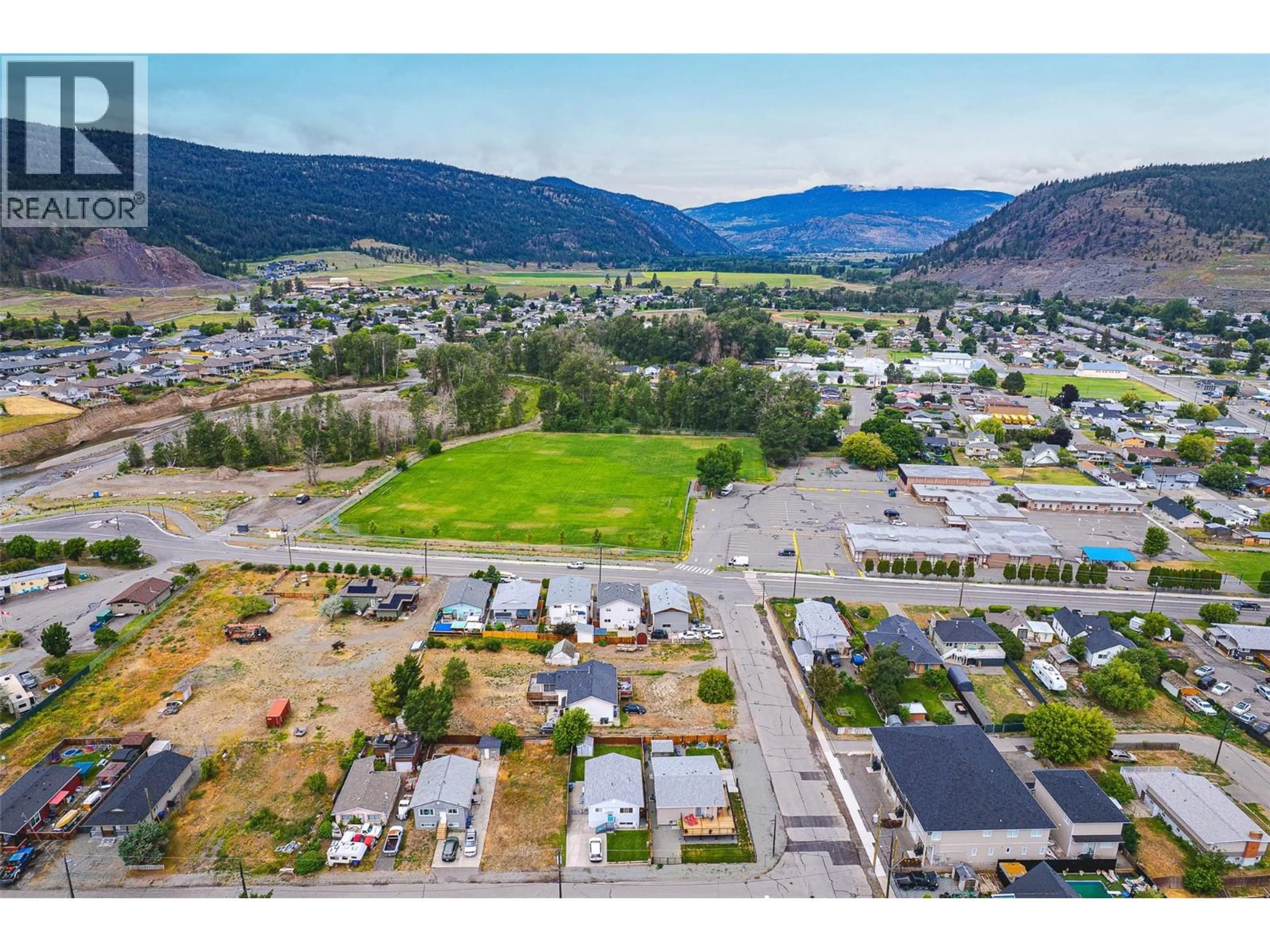 A pic from outside/outdoor area/front of a property/back of a property/a pic from drone, mountain view for 1376 VOGHT STREET, Merritt British Columbia V1K1B8
