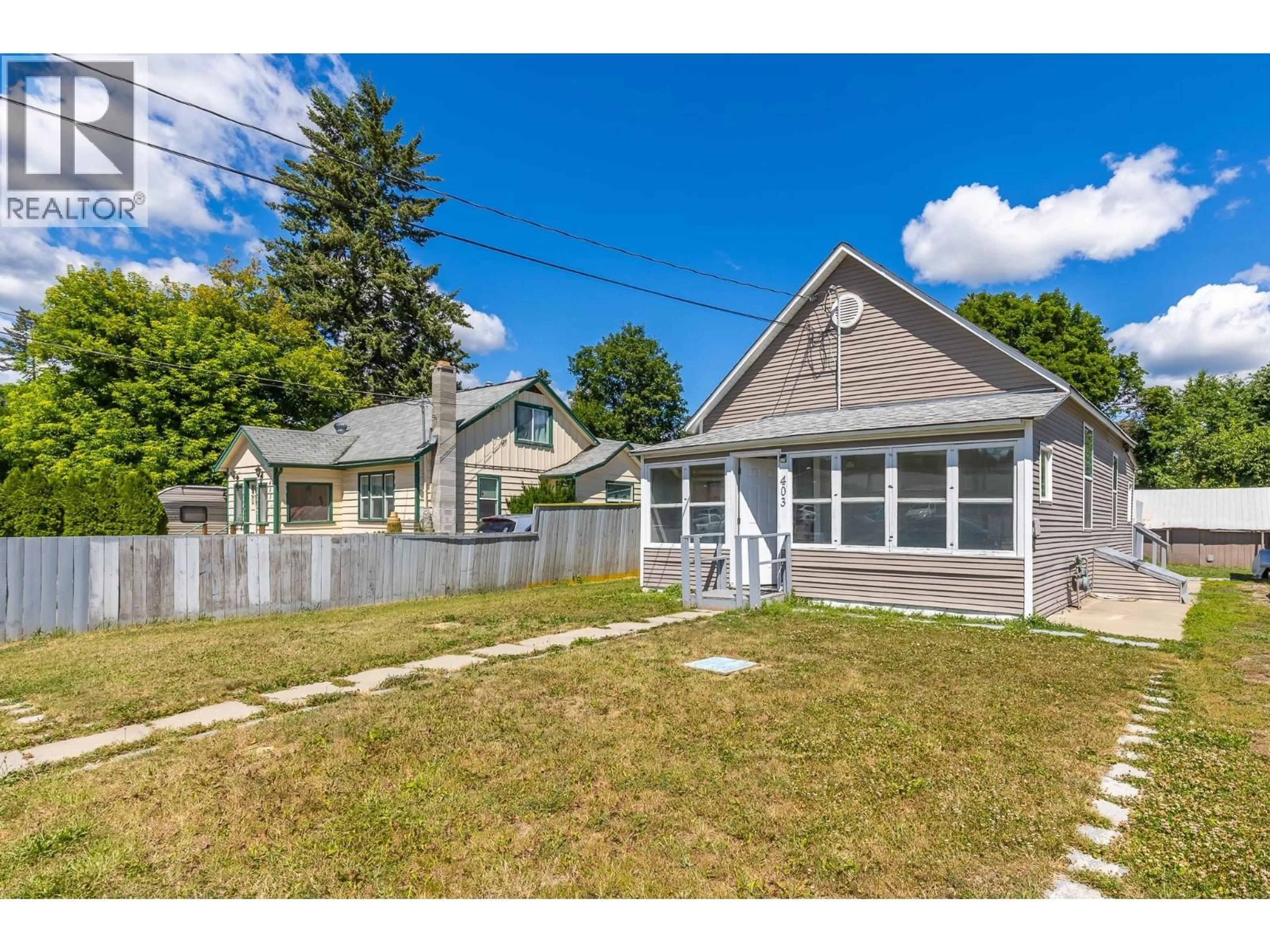 A pic from outside/outdoor area/front of a property/back of a property/a pic from drone, street for 403 HOWARD AVENUE, Enderby British Columbia V0E1V2