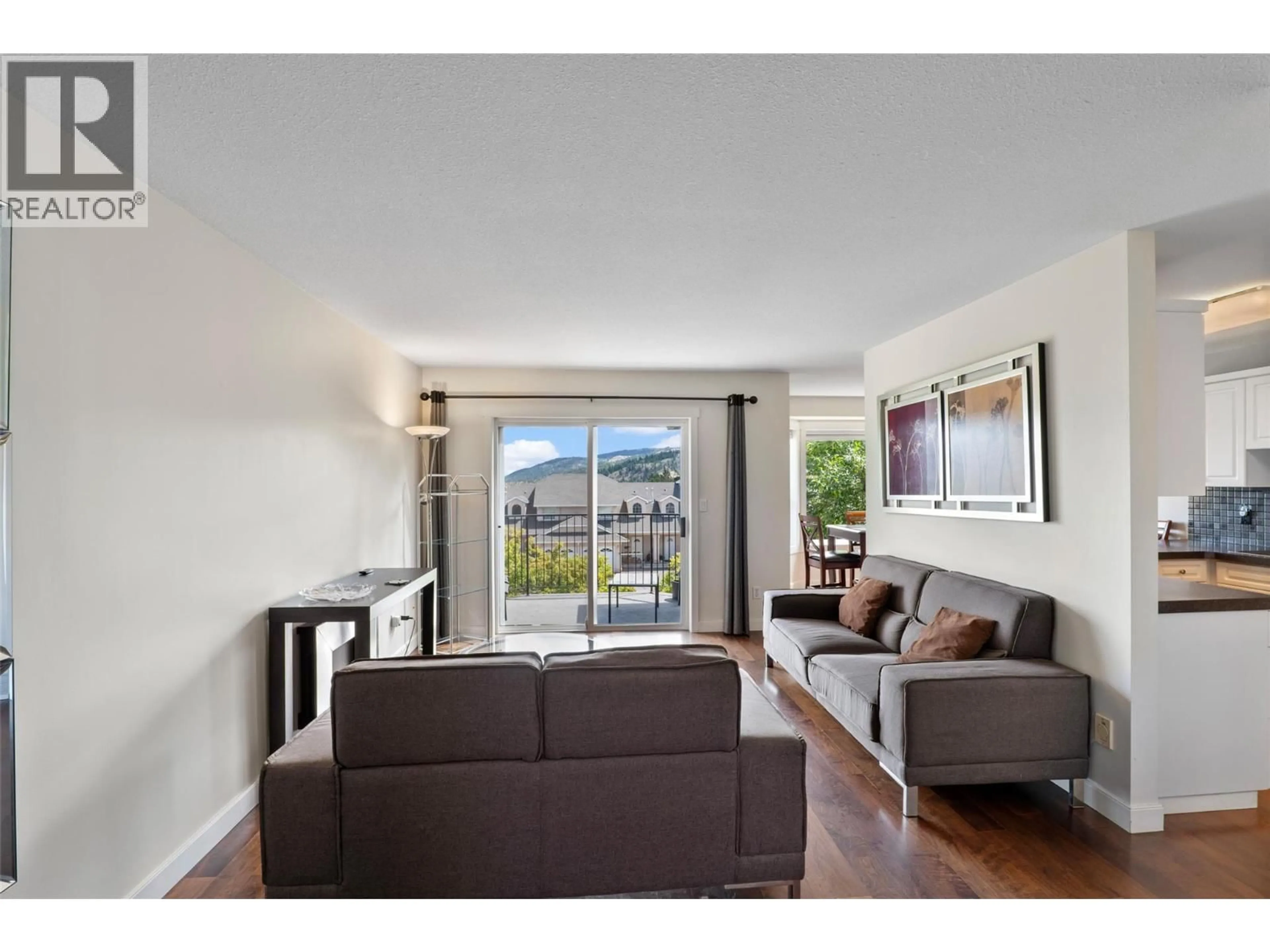 Living room with furniture, wood/laminate floor for 32 - 1750 MCKINLEY COURT, Kamloops British Columbia V2E2N5
