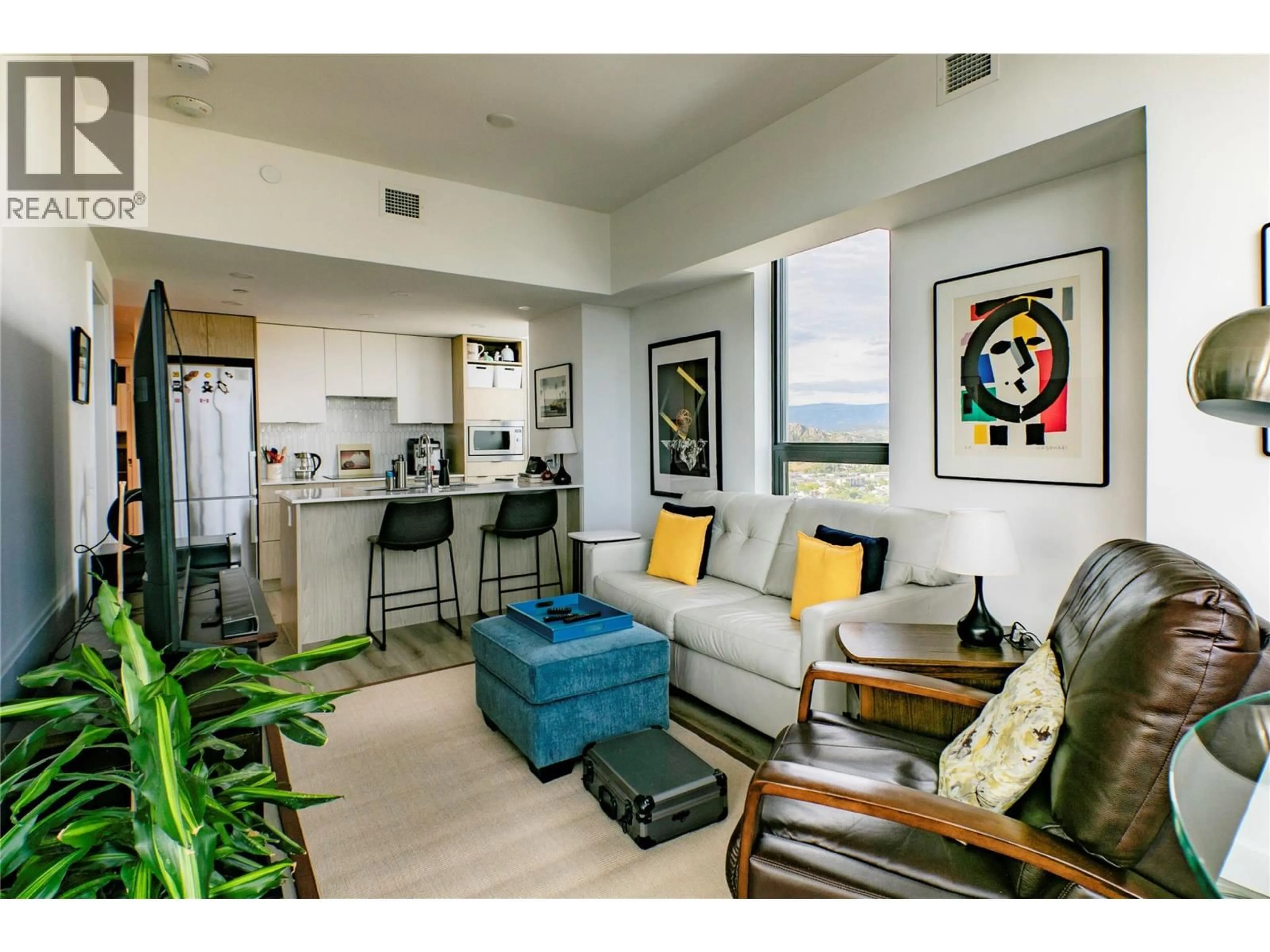 Living room with furniture, unknown for 3005 - 1488 BERTRAM STREET, Kelowna British Columbia V1Y0M6
