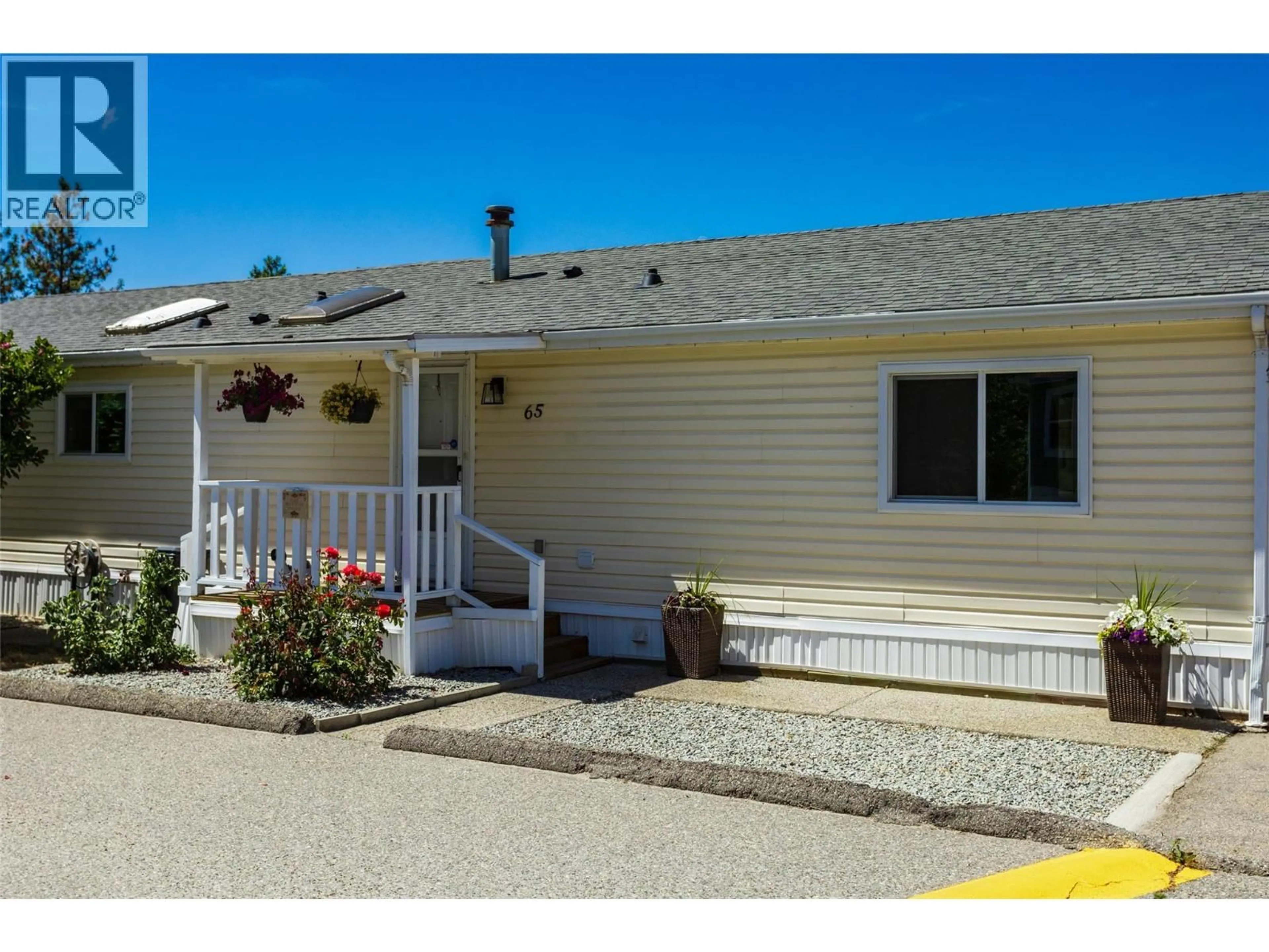 Home with vinyl exterior material, street for 65 - 3225 SHANNON LAKE ROAD, West Kelowna British Columbia V4T2E2