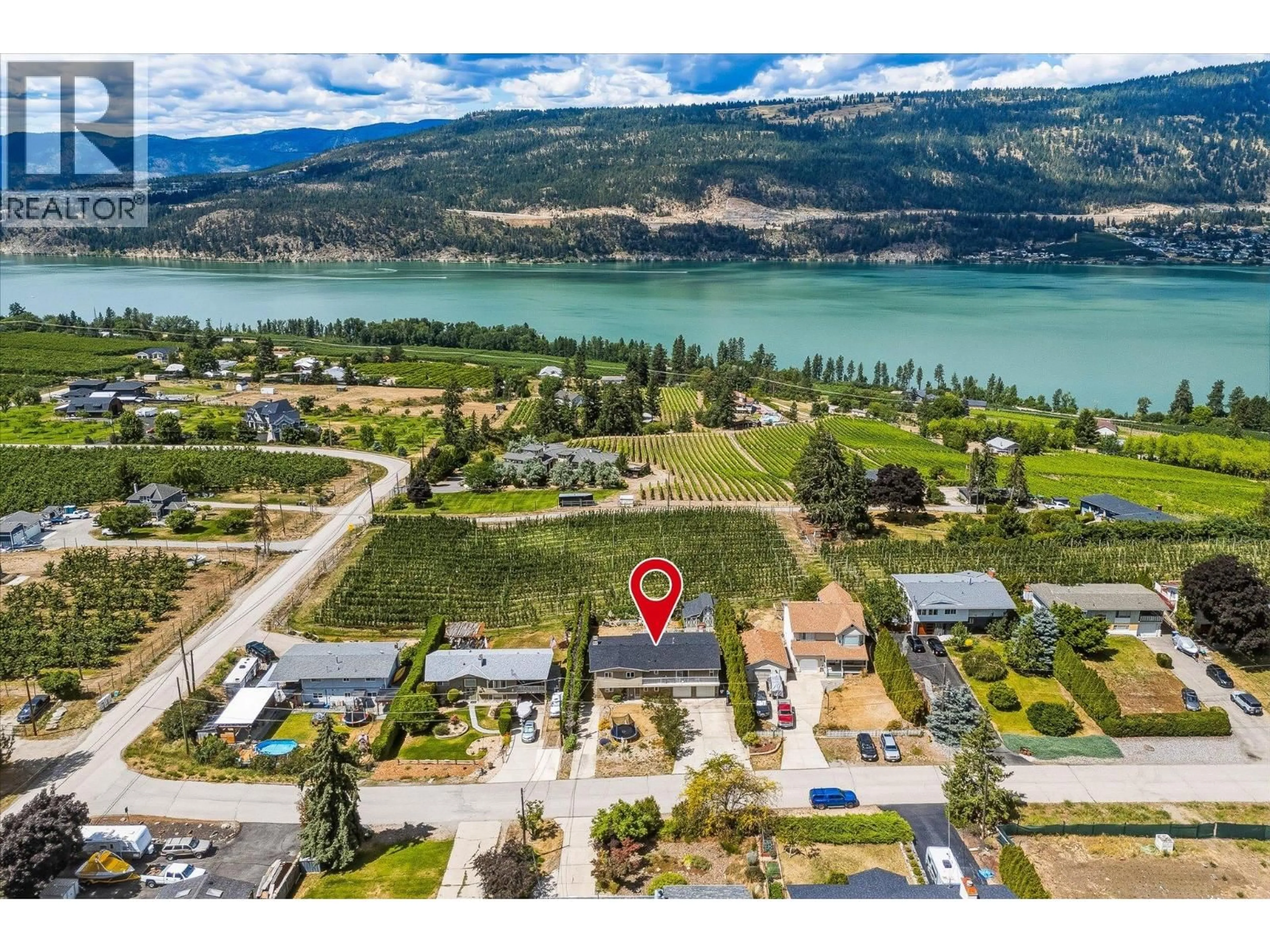 A pic from outside/outdoor area/front of a property/back of a property/a pic from drone, water/lake/river/ocean view for 14262 HARMEN ROAD, Lake Country British Columbia V4V2B9